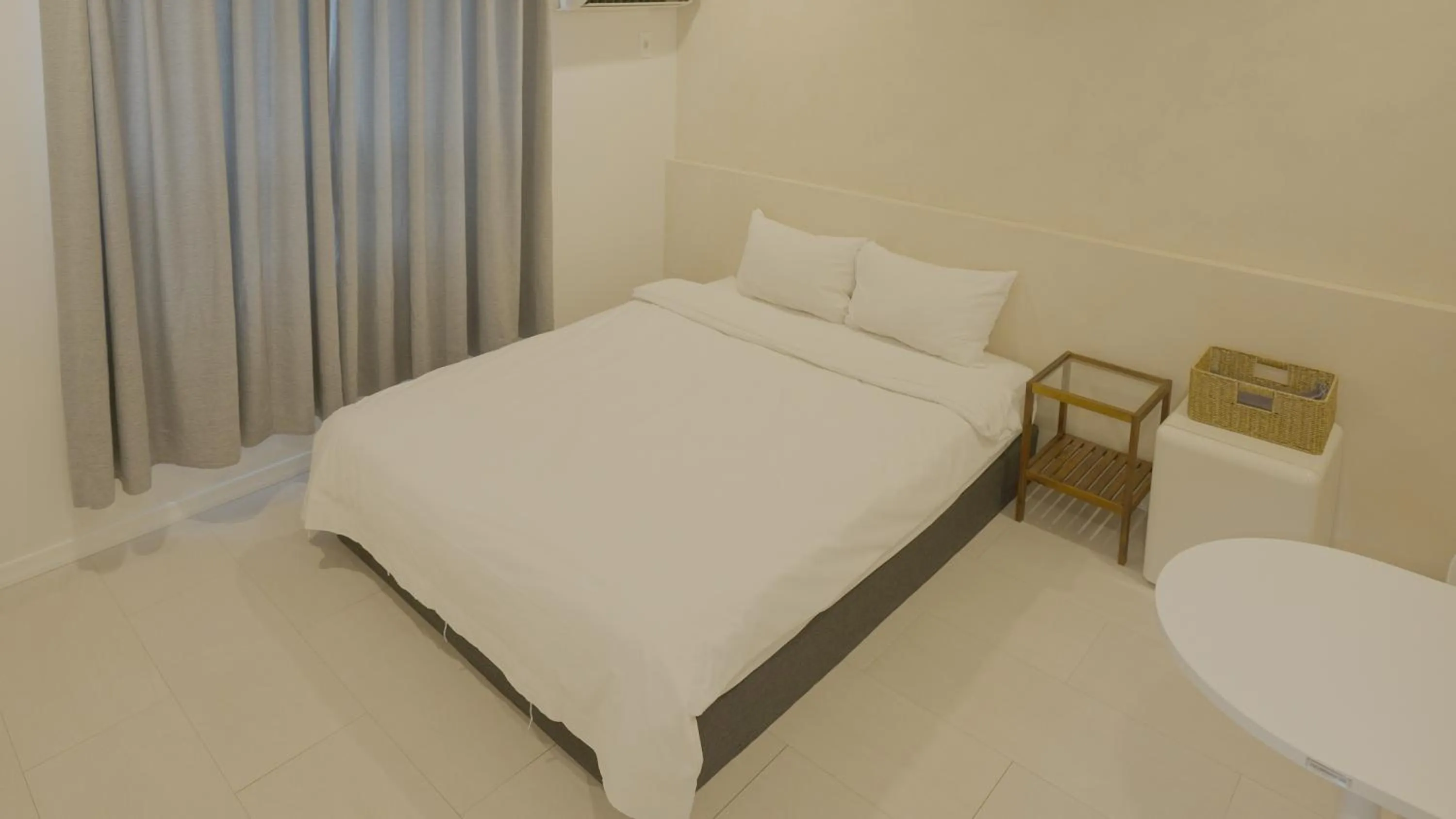 Bed in Jeju Stay Hotel