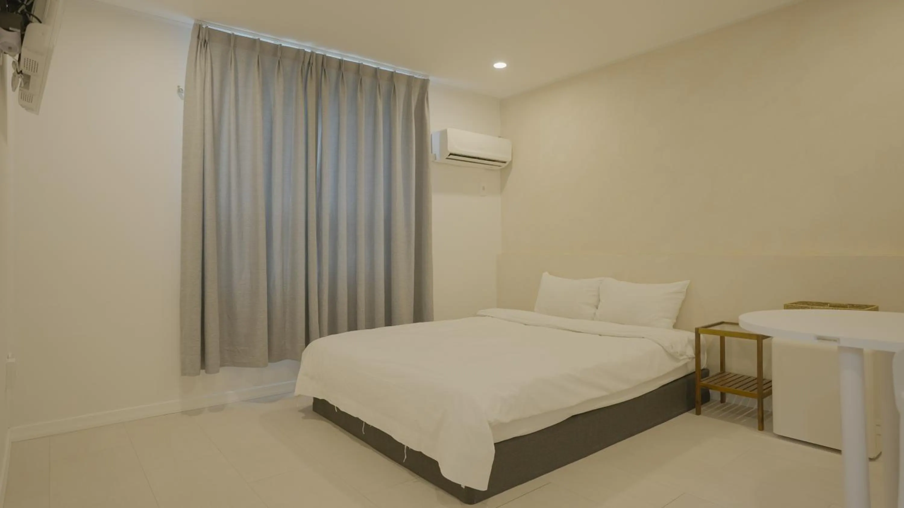 Bed in Jeju Stay Hotel