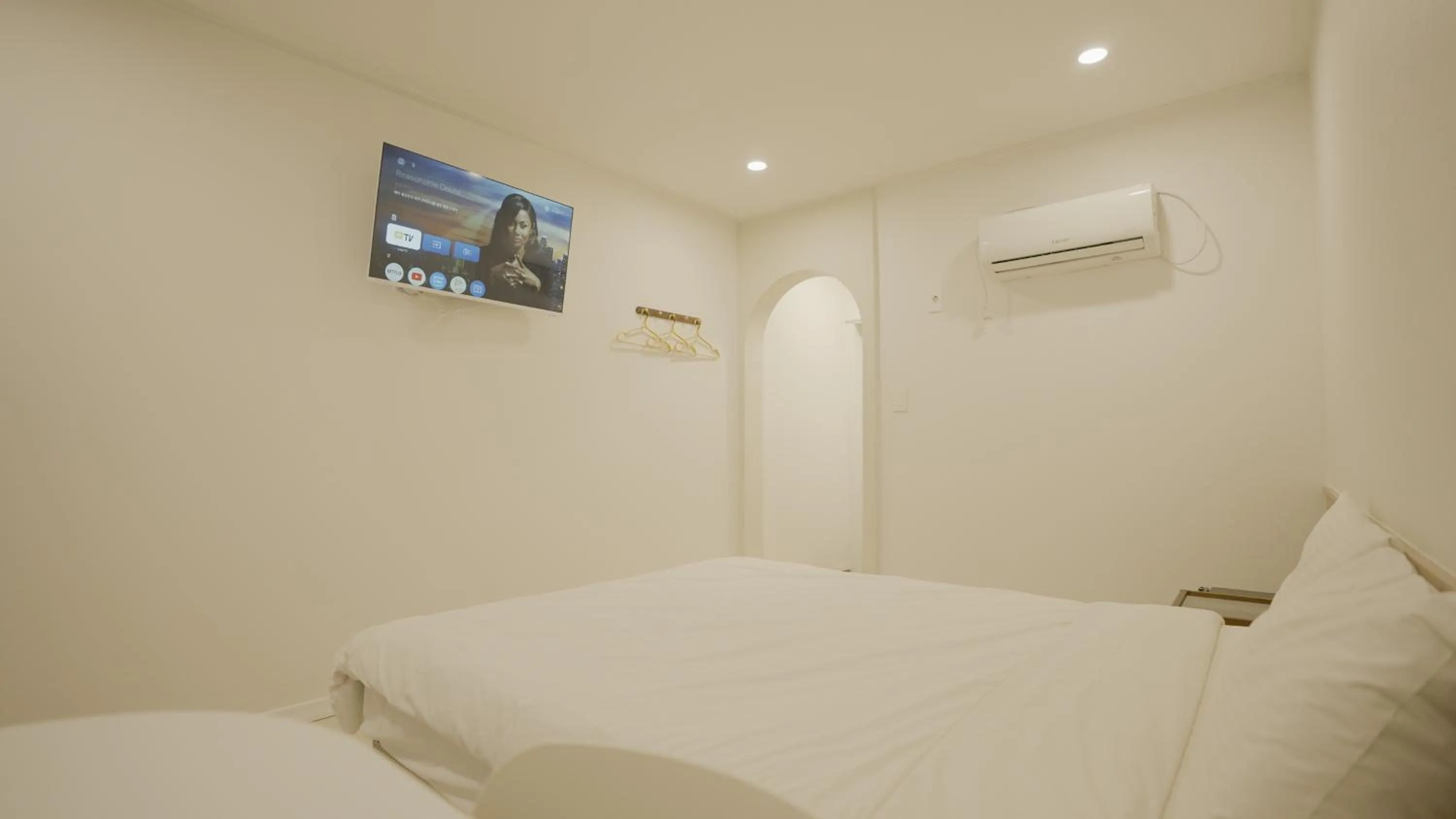 Bed in Jeju Stay Hotel