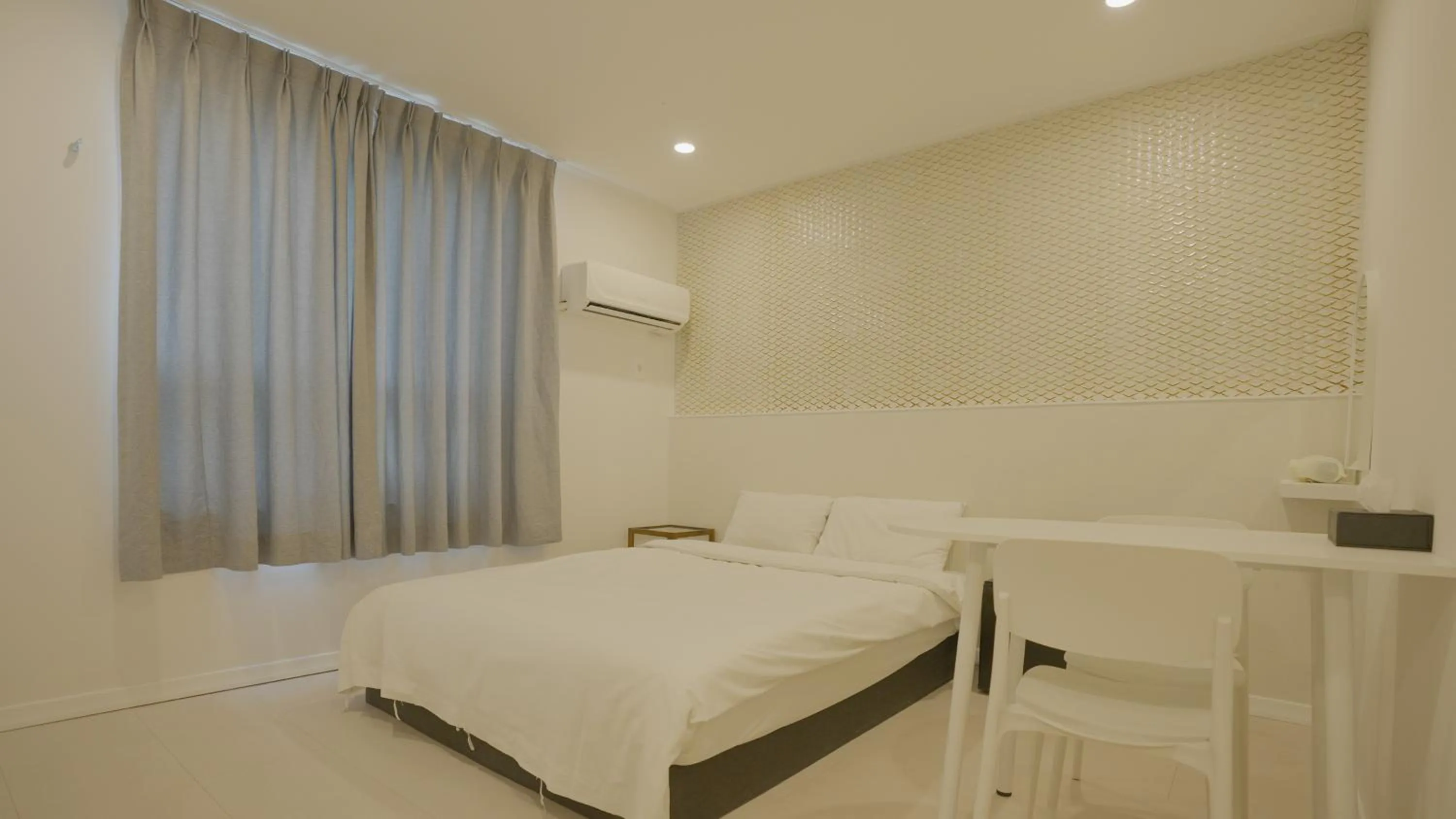 Bed in Jeju Stay Hotel