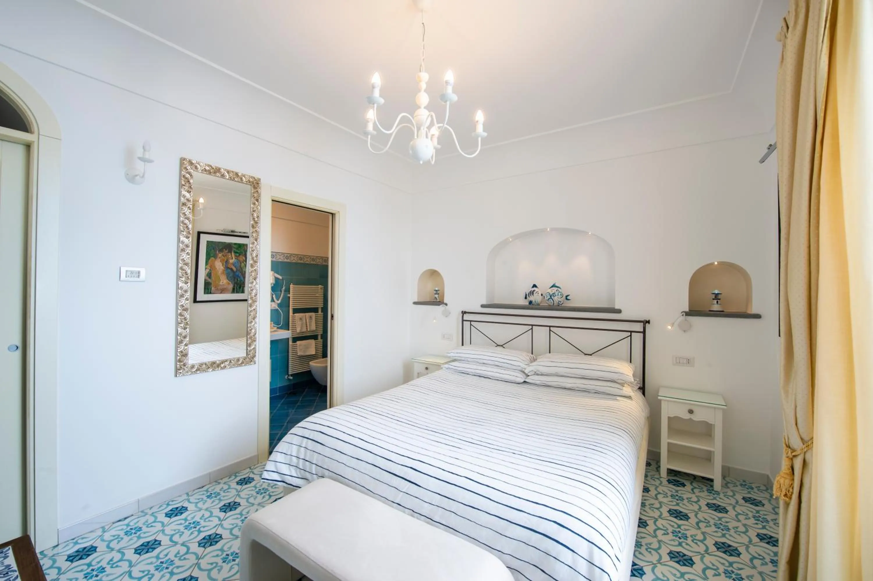 Bed in Albadamare Boutique Hotel