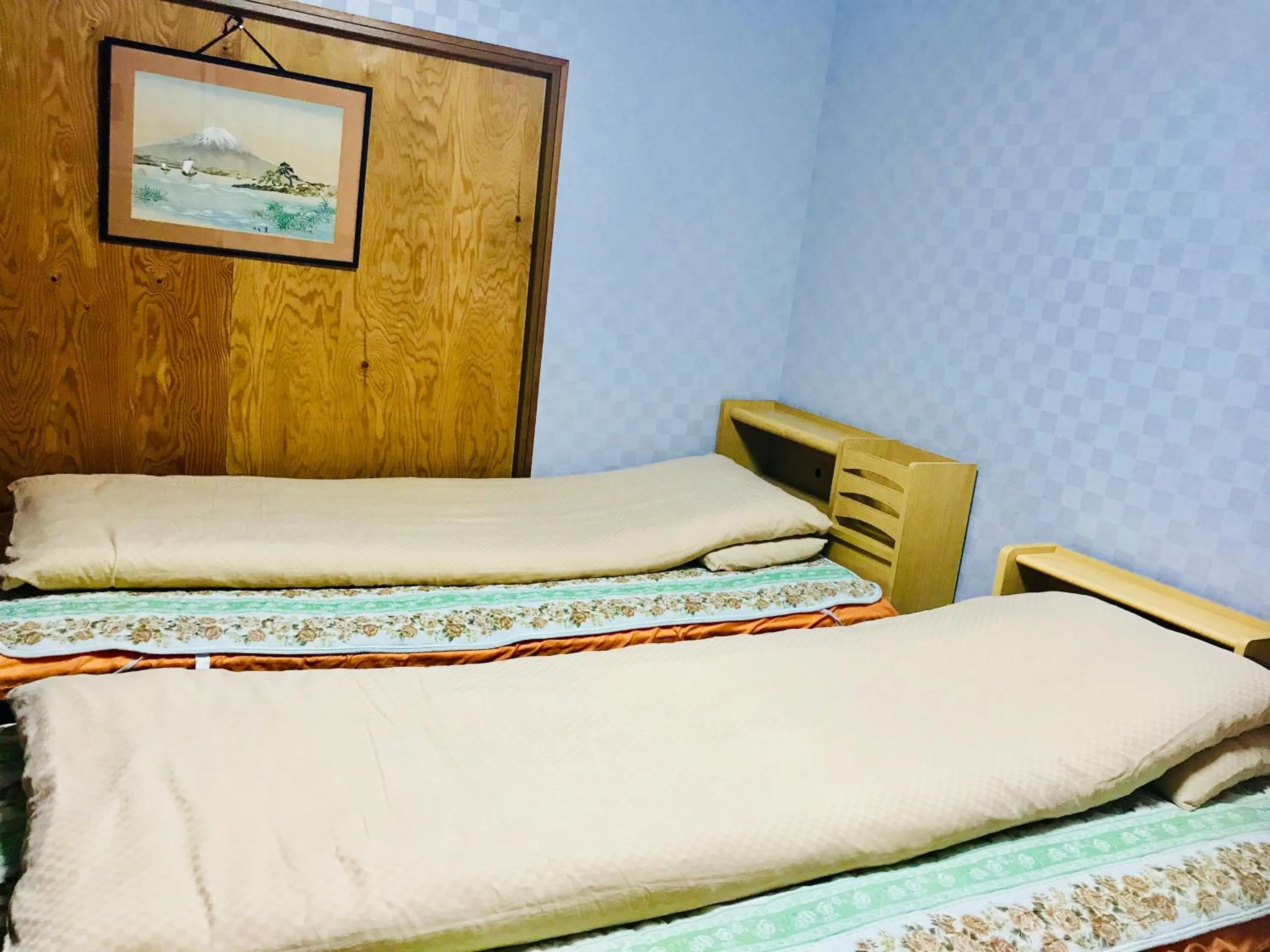 Bed in Minshuku Kaikeibo