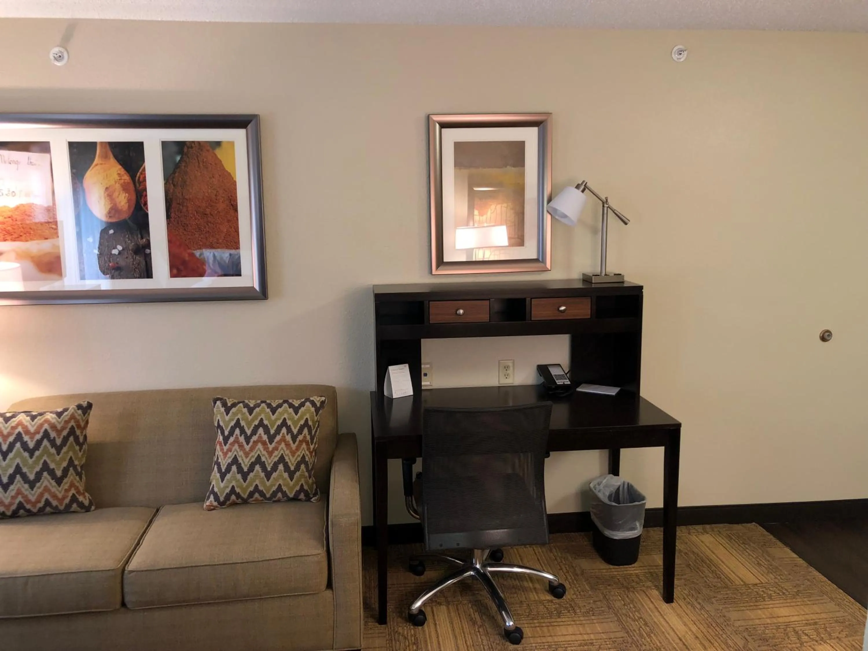Living room in Staybridge Suites Grand Rapids-Kentwood by IHG