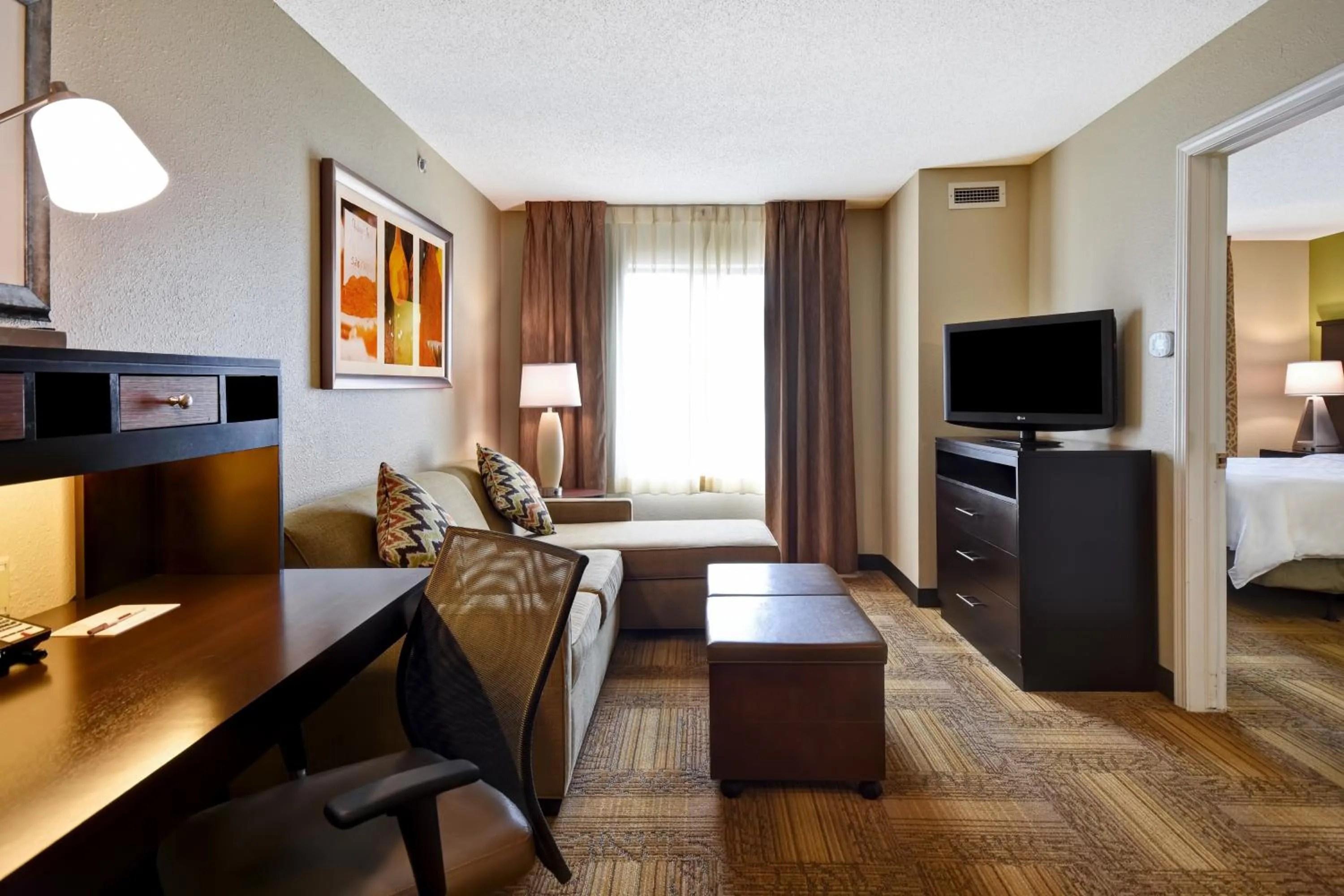 Photo of the whole room, Bed in Staybridge Suites Grand Rapids-Kentwood by IHG