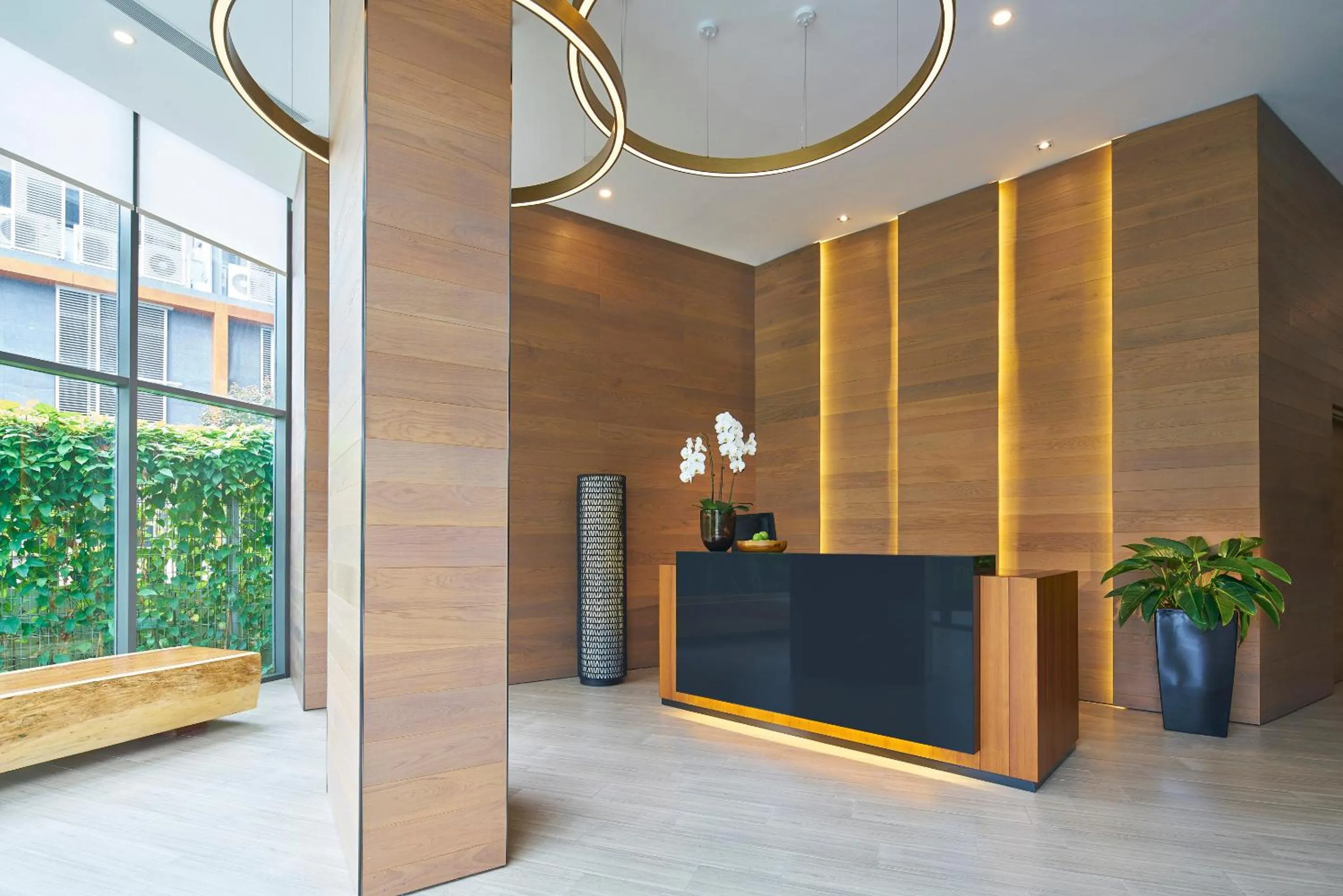Lobby or reception in Oasia Residence Singapore by Far East Hospitality