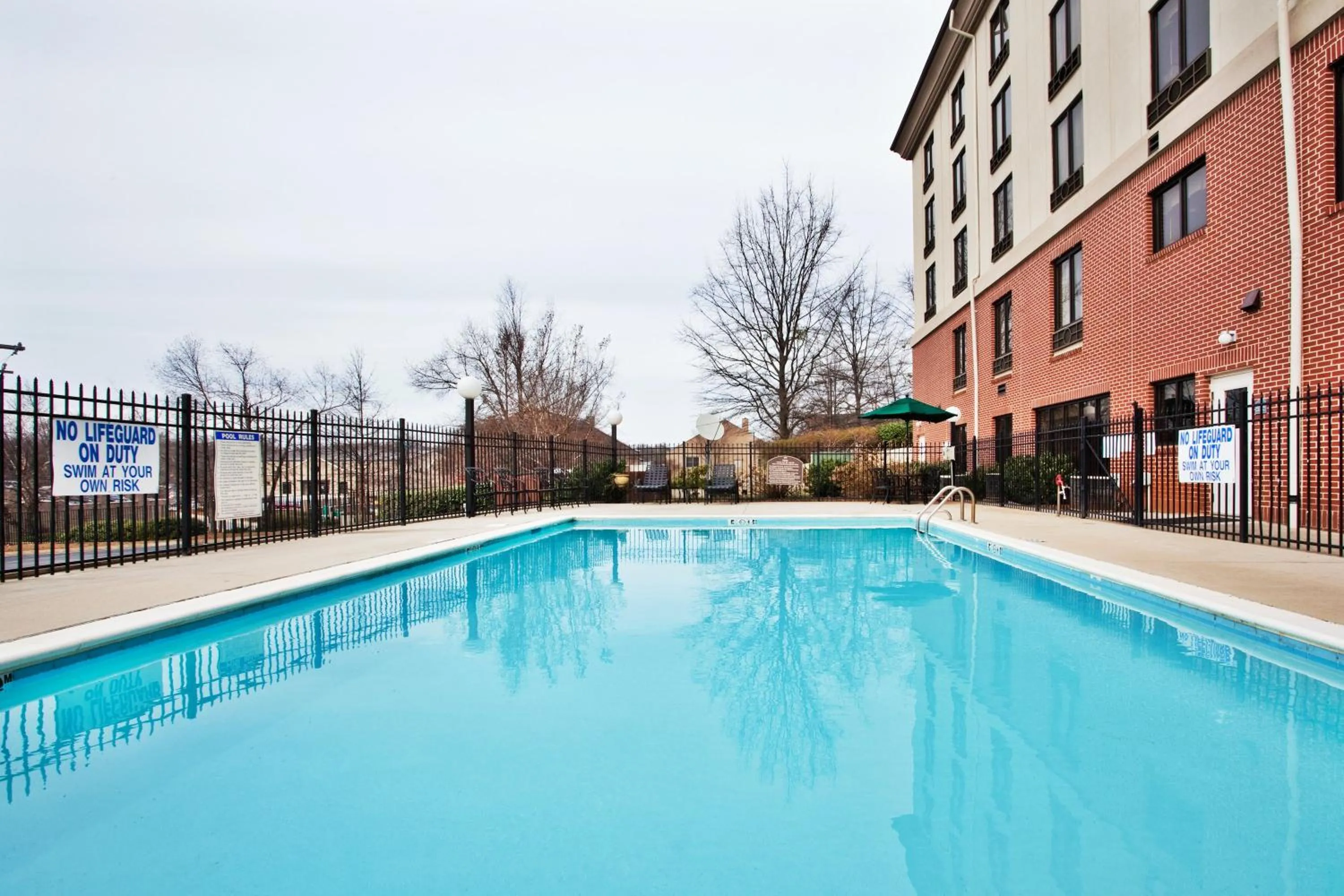 Swimming pool in Holiday Inn Express & Suites Greenville-Downtown by IHG