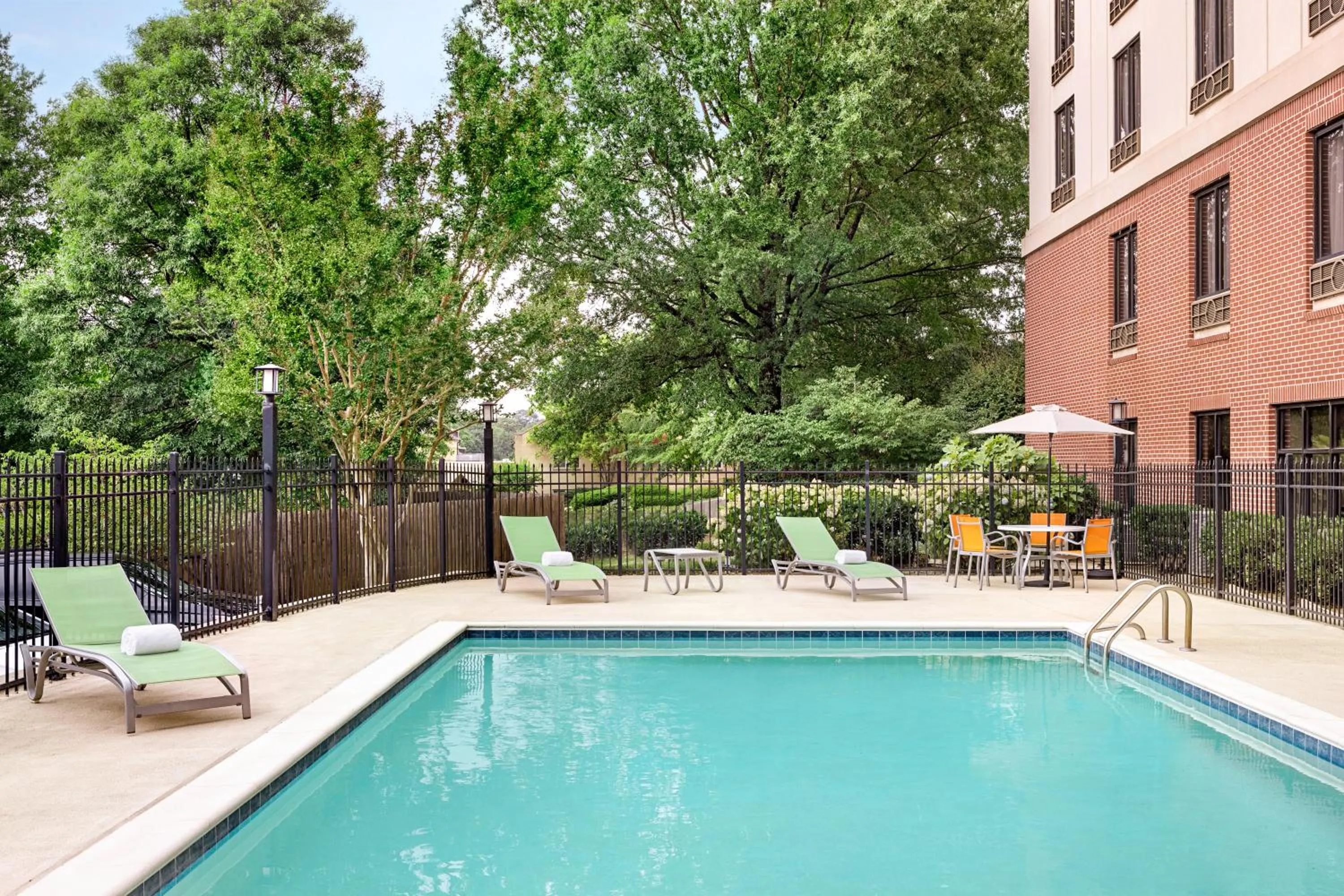 Swimming pool in Holiday Inn Express & Suites Greenville-Downtown by IHG