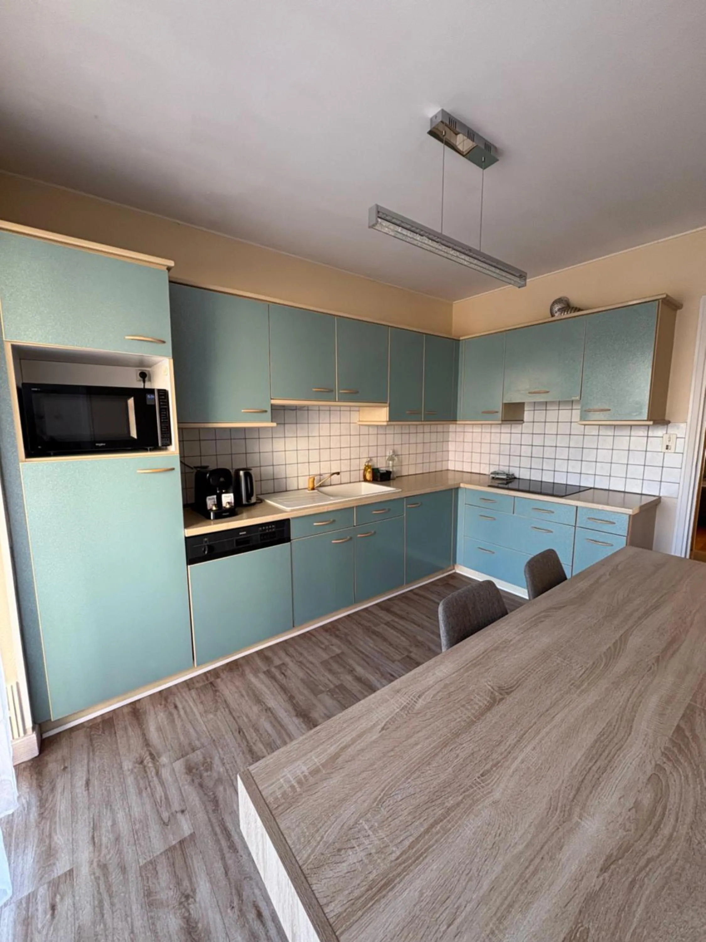 kitchen in Cit'hôtel Le Chris'tel hôtel et restaurant