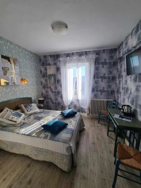 Bed in Hotel Belle Vue