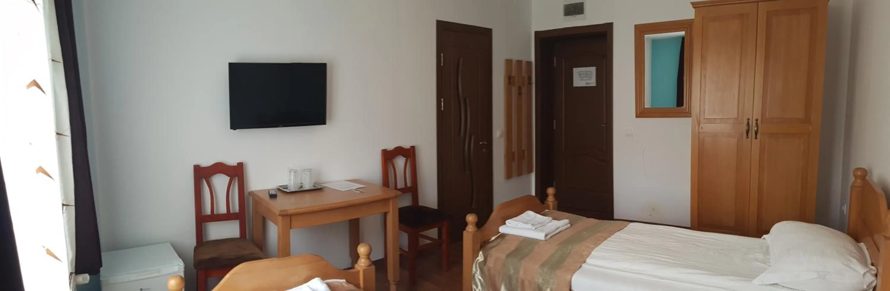 Photo of the whole room, Bed in Pensiunea Muresul