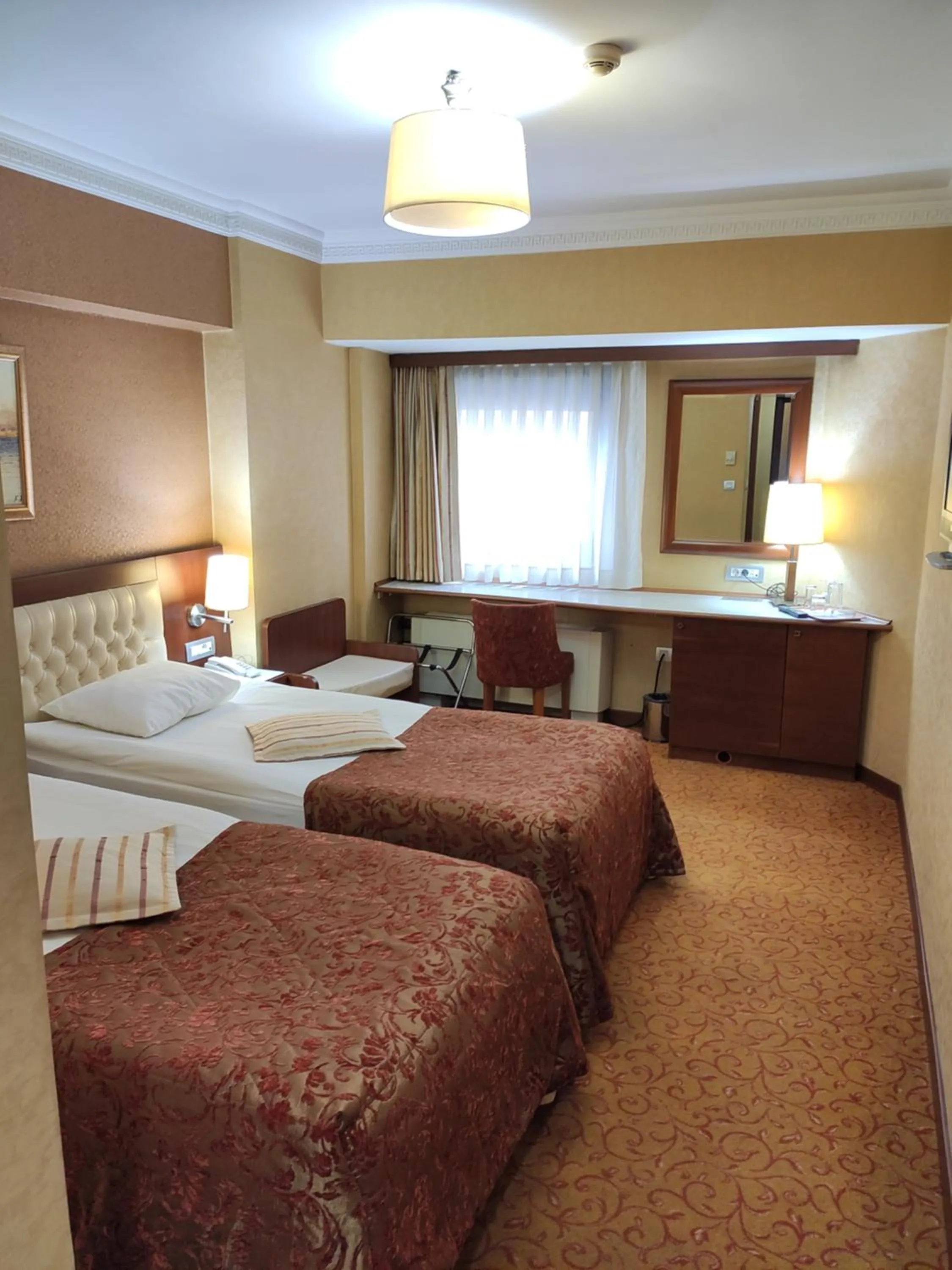 Bed in Yuksel Hotel