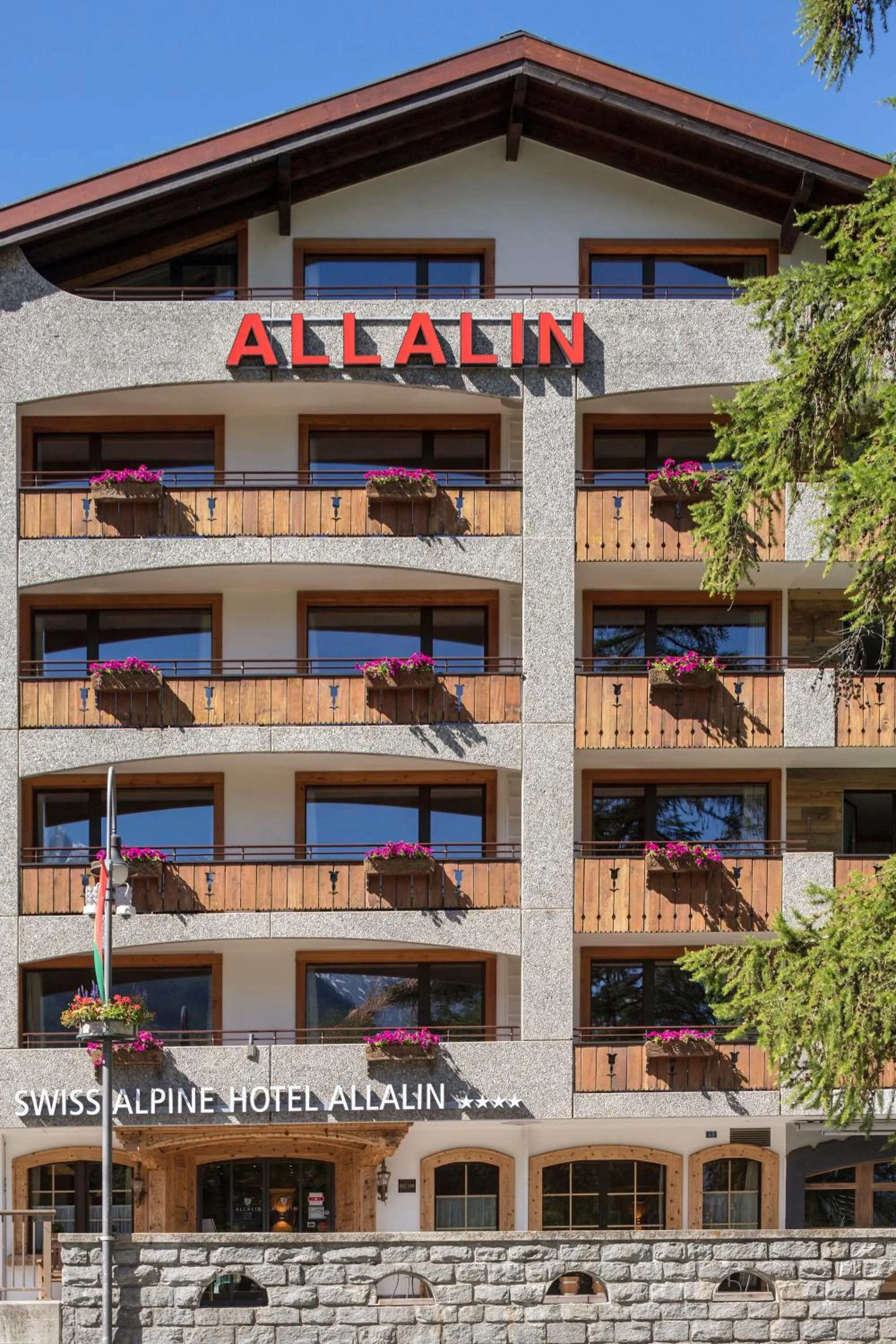 Facade/entrance in Swiss Alpine Hotel Allalin