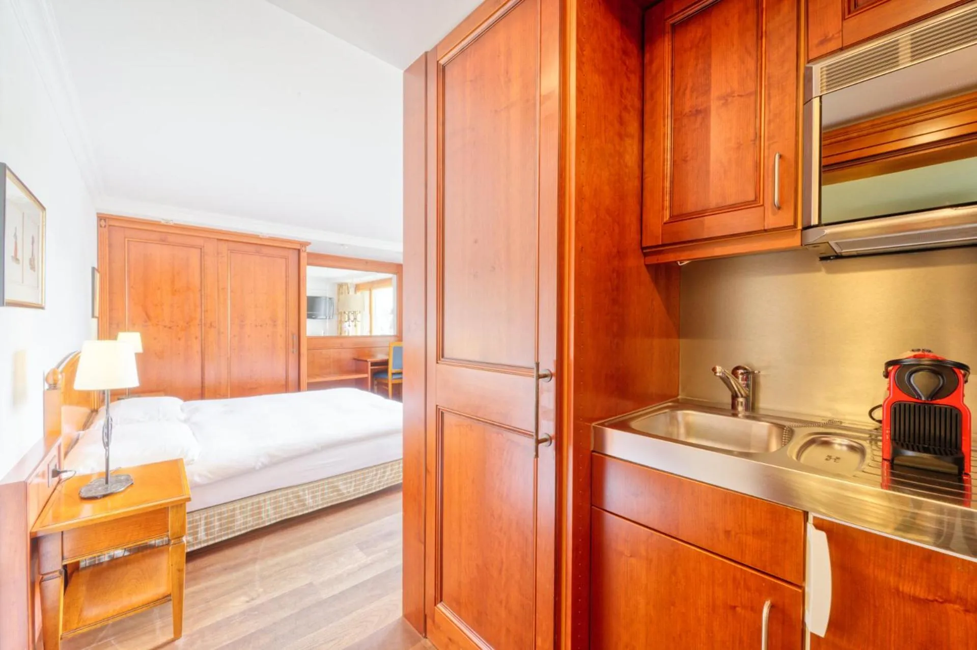 Kitchen or kitchenette, Bed in Arca Aparthotel & Spa