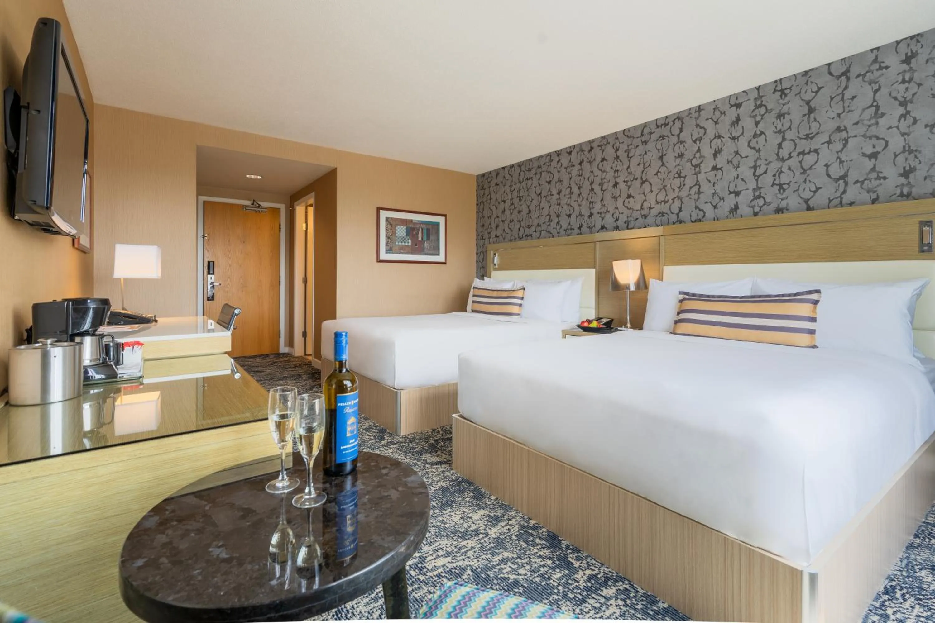 Bed in Executive Plaza Hotel & Conference Centre, Metro Vancouver