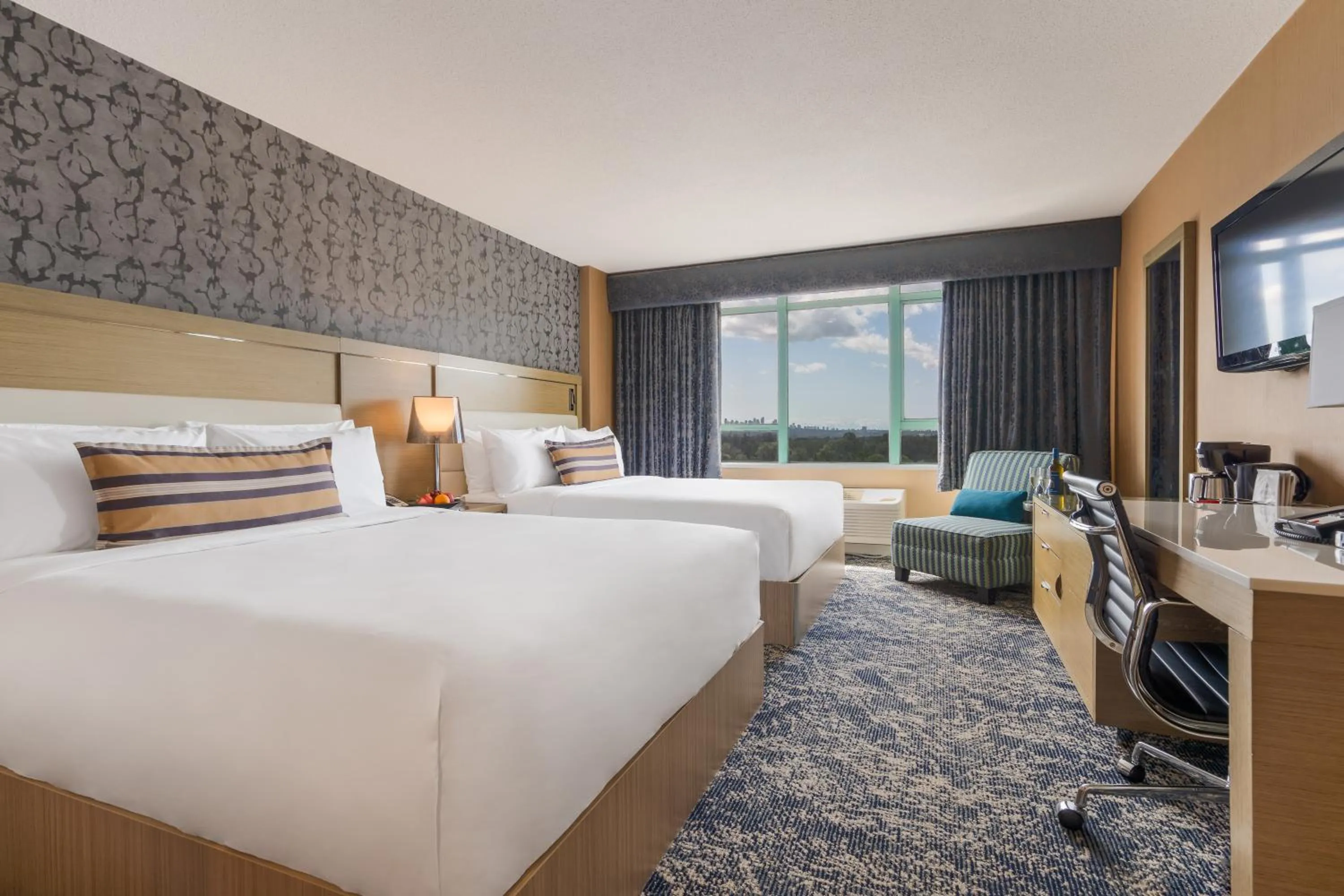 Bed in Executive Plaza Hotel & Conference Centre, Metro Vancouver