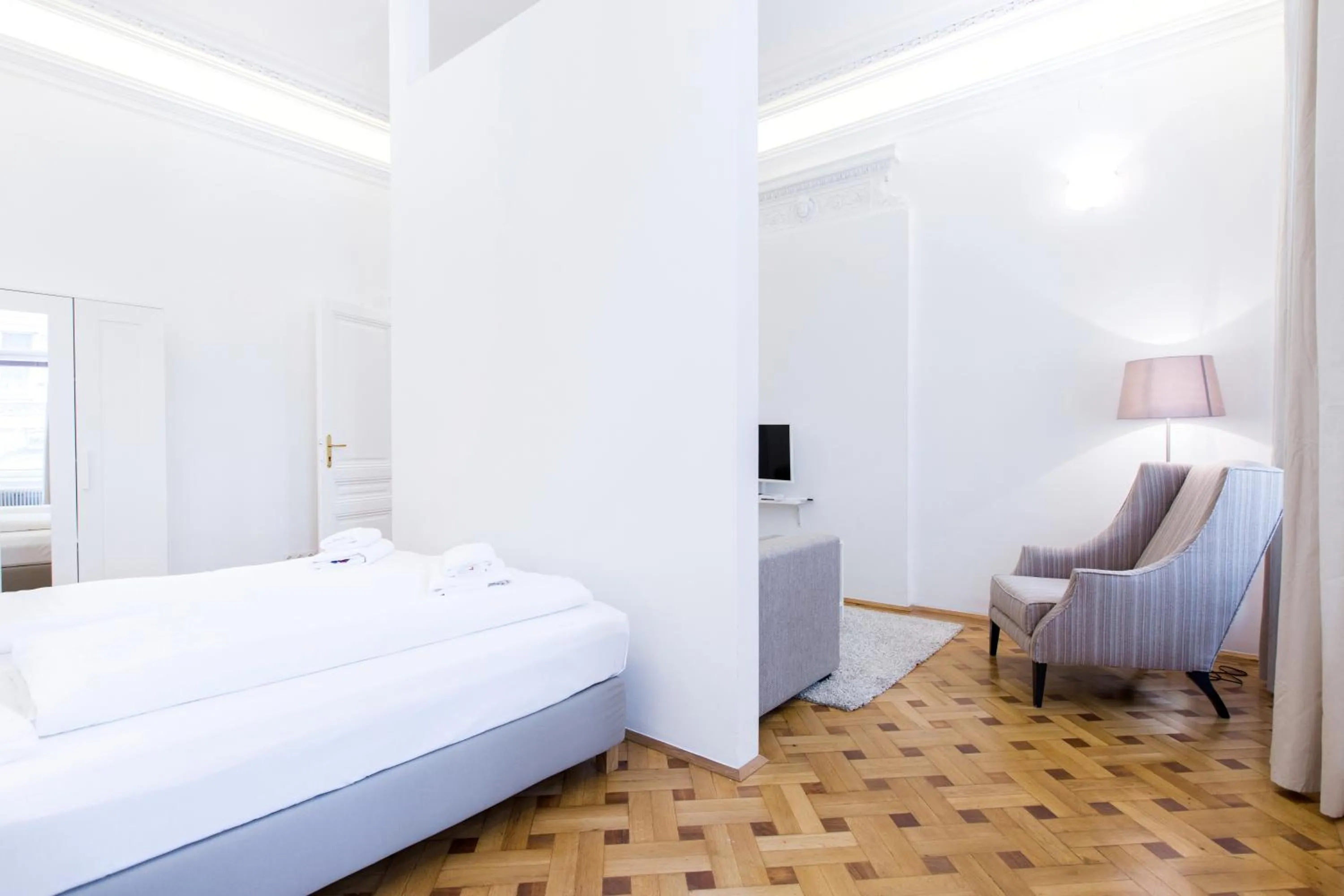 Photo of the whole room, Bed in HeyMi Apartments in City Center