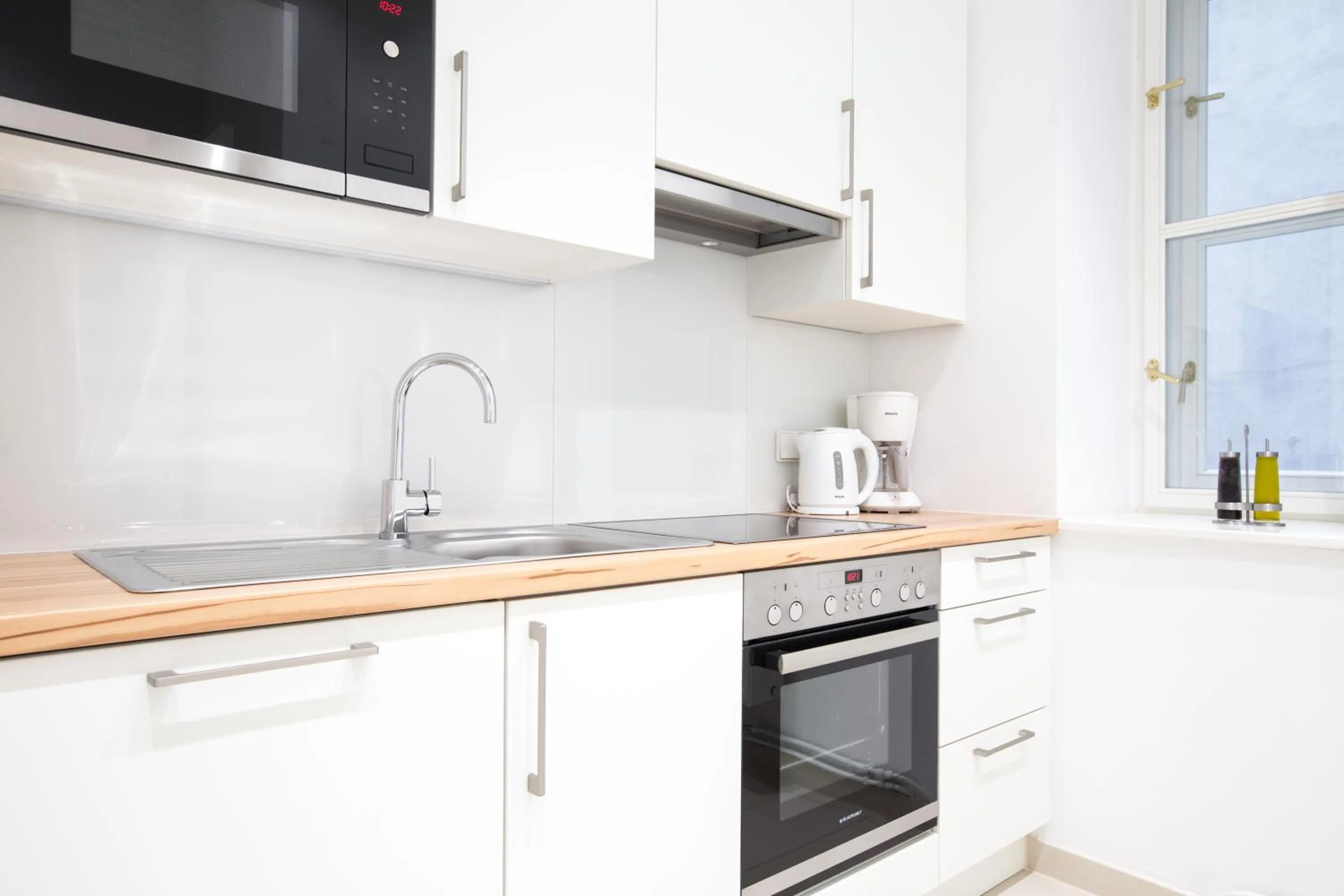Kitchen or kitchenette in HeyMi Apartments in City Center