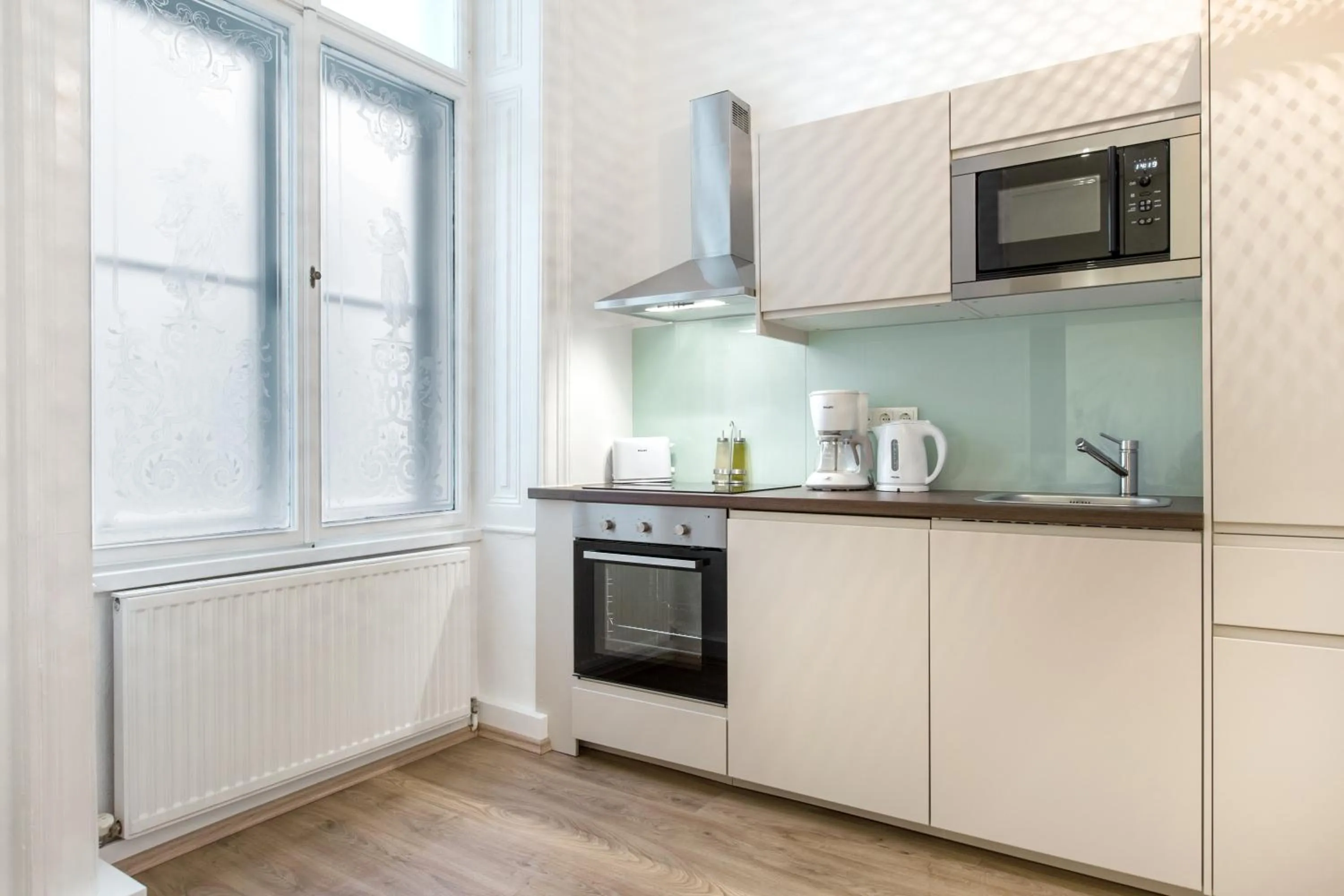 Kitchen or kitchenette in HeyMi Apartments in City Center