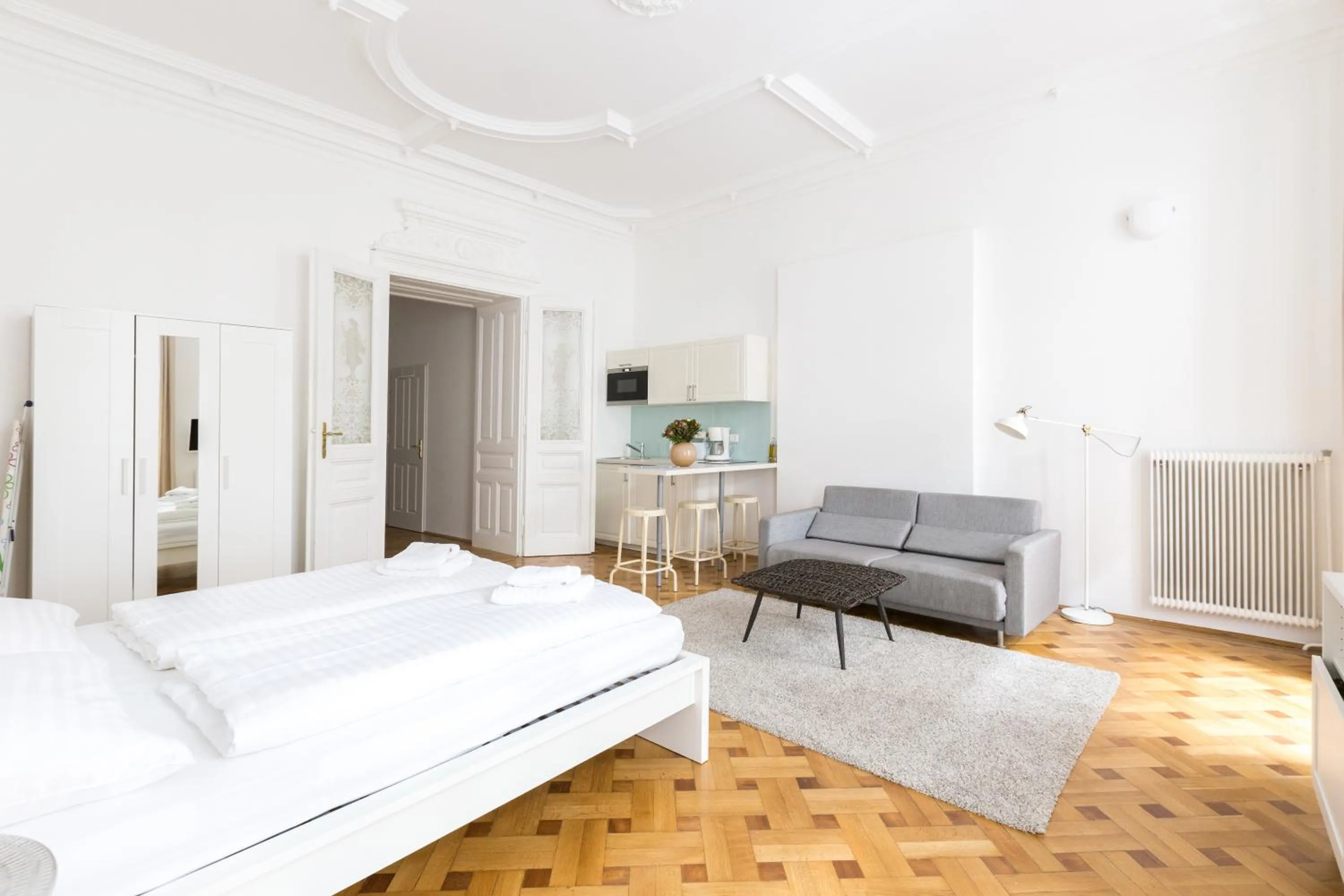 Photo of the whole room, Bed in HeyMi Apartments in City Center