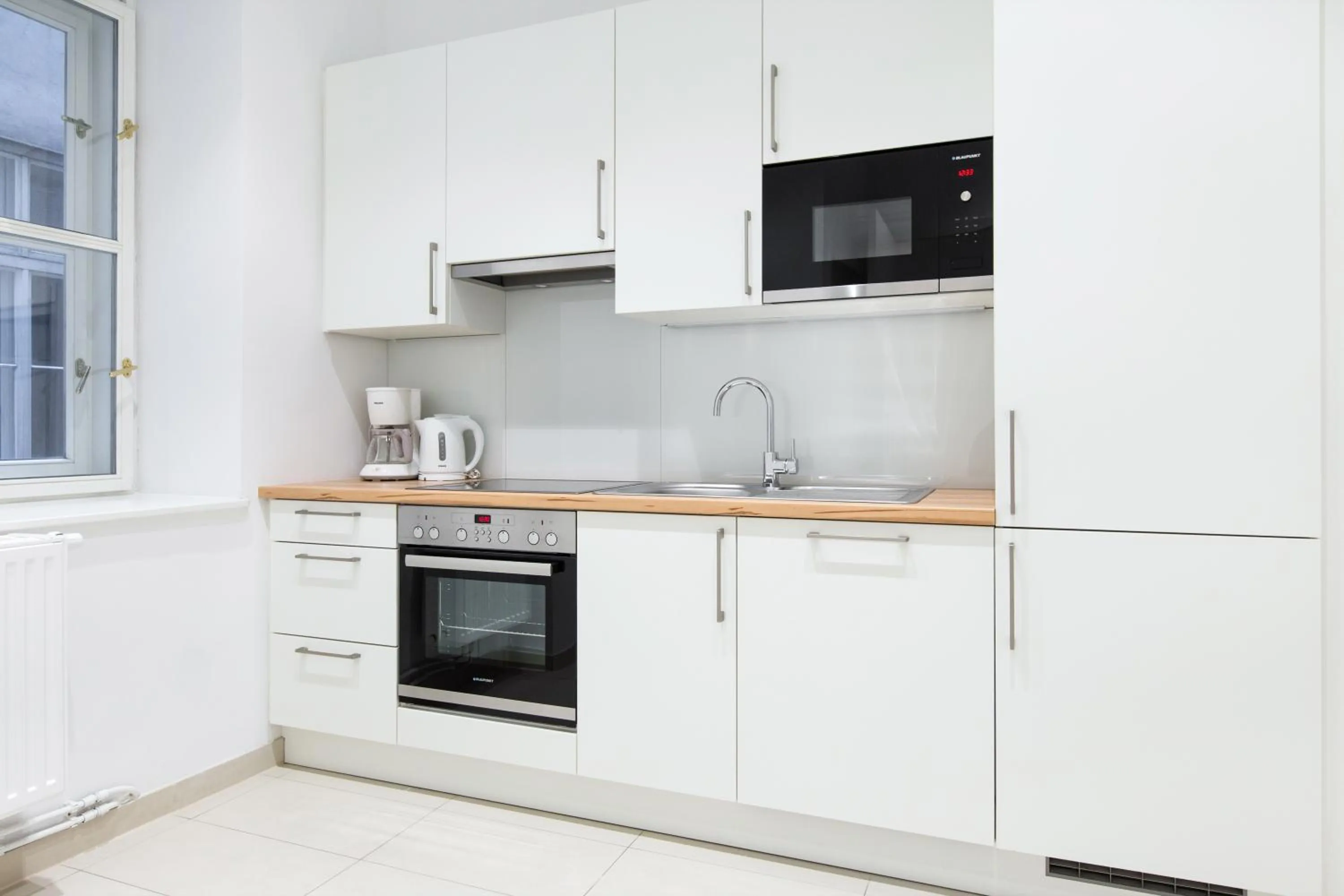 Kitchen or kitchenette in HeyMi Apartments in City Center