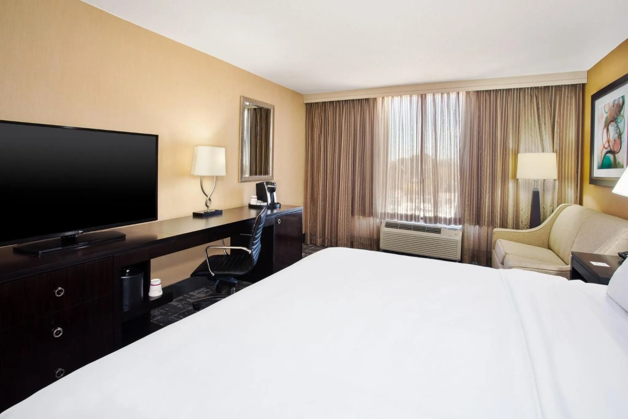 Photo of the whole room, Bed in Crowne Plaza Greenville by IHG
