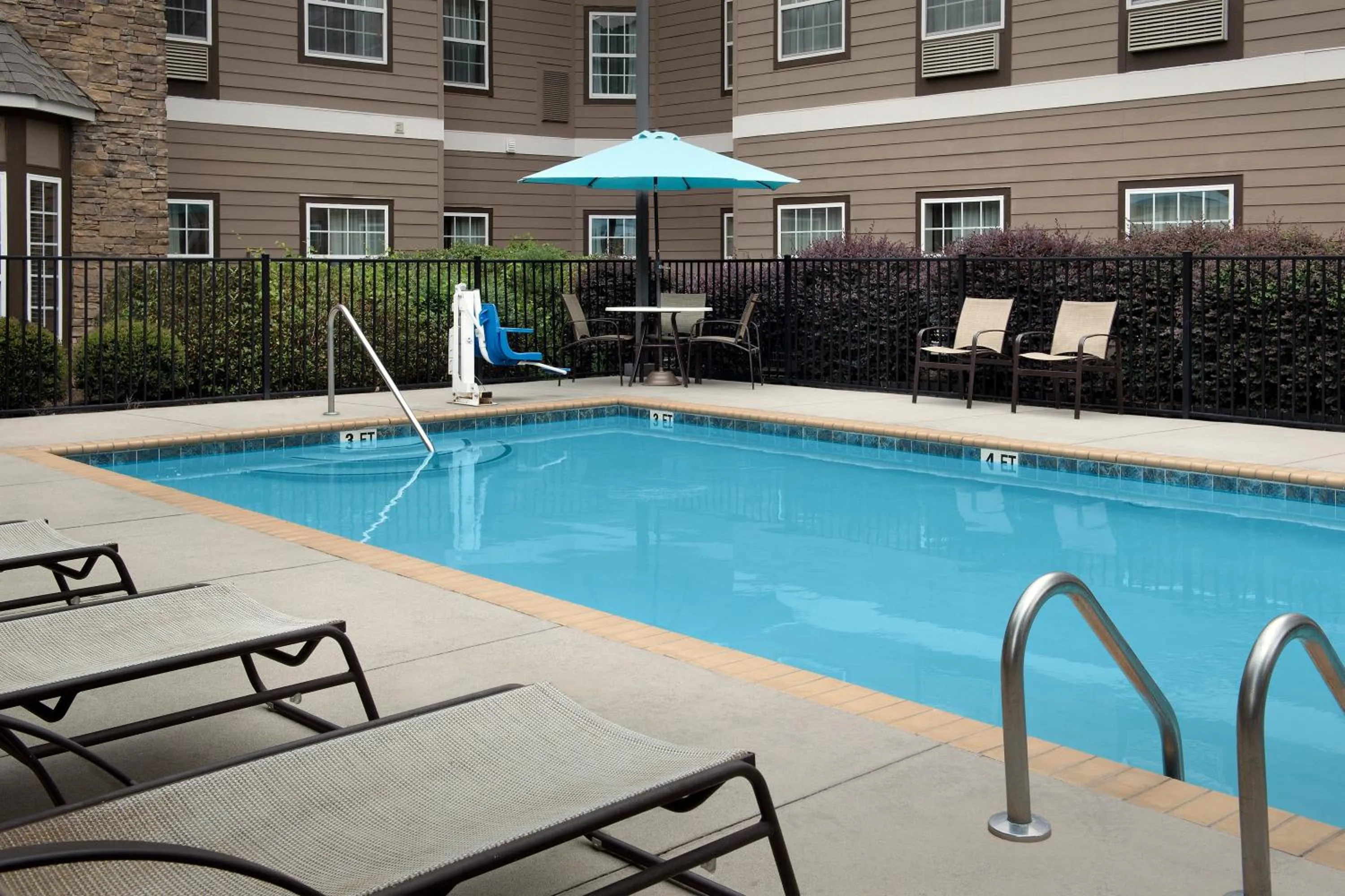 Swimming pool in Staybridge Suites Greenville I-85 Woodruff Road by IHG