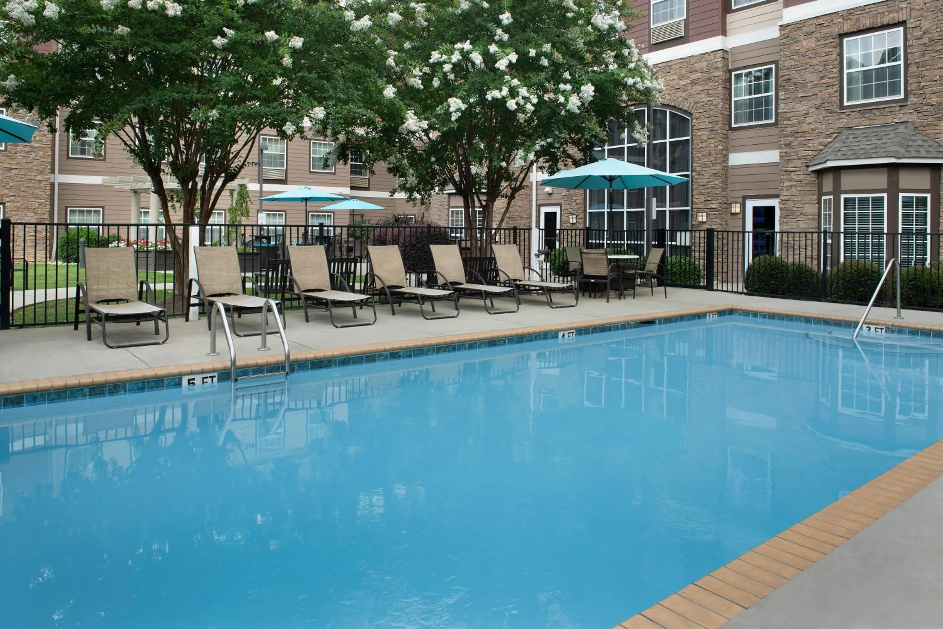 Pool view in Staybridge Suites Greenville I-85 Woodruff Road by IHG