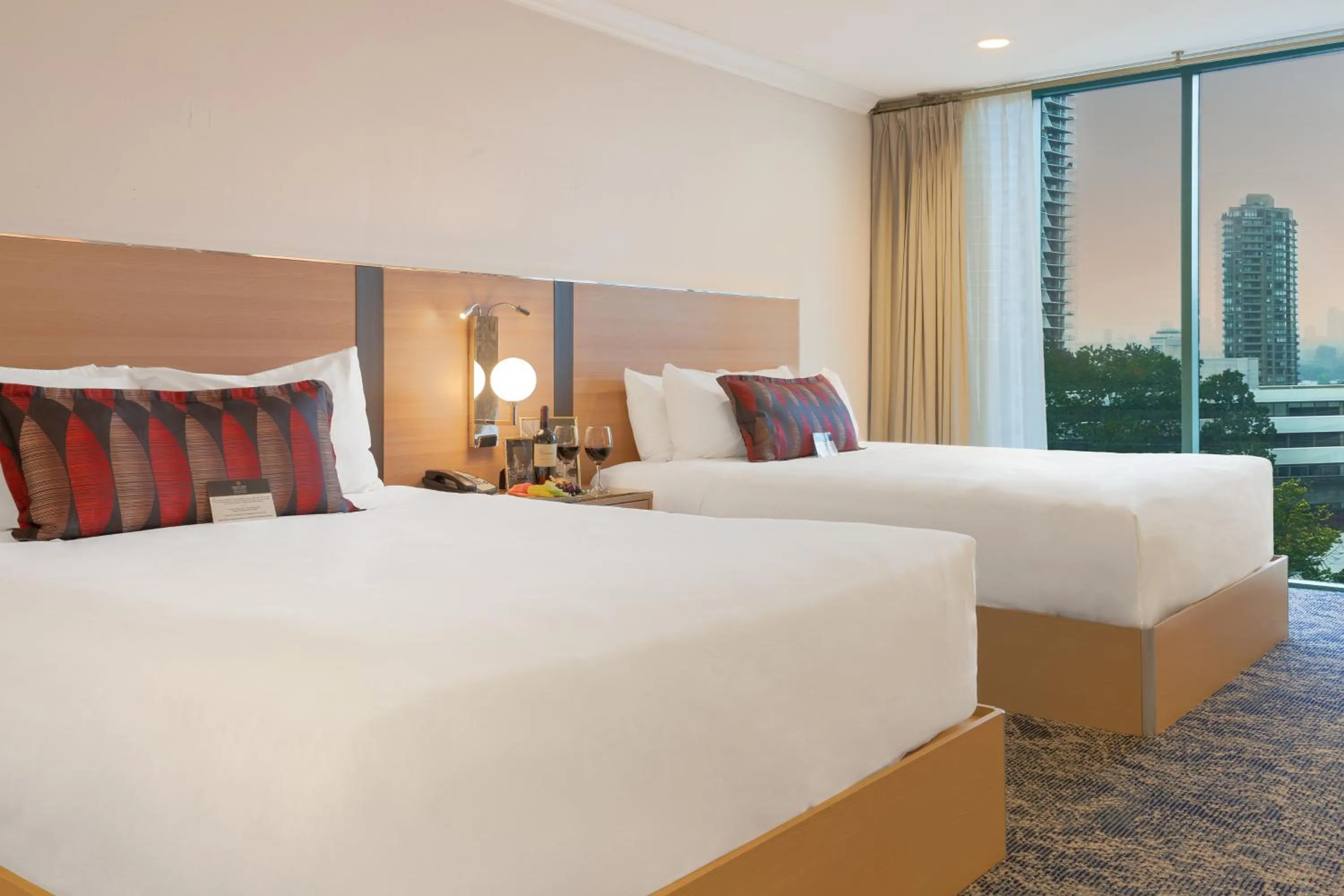 Bed in Executive Suites Hotel & Conference Center, Metro Vancouver