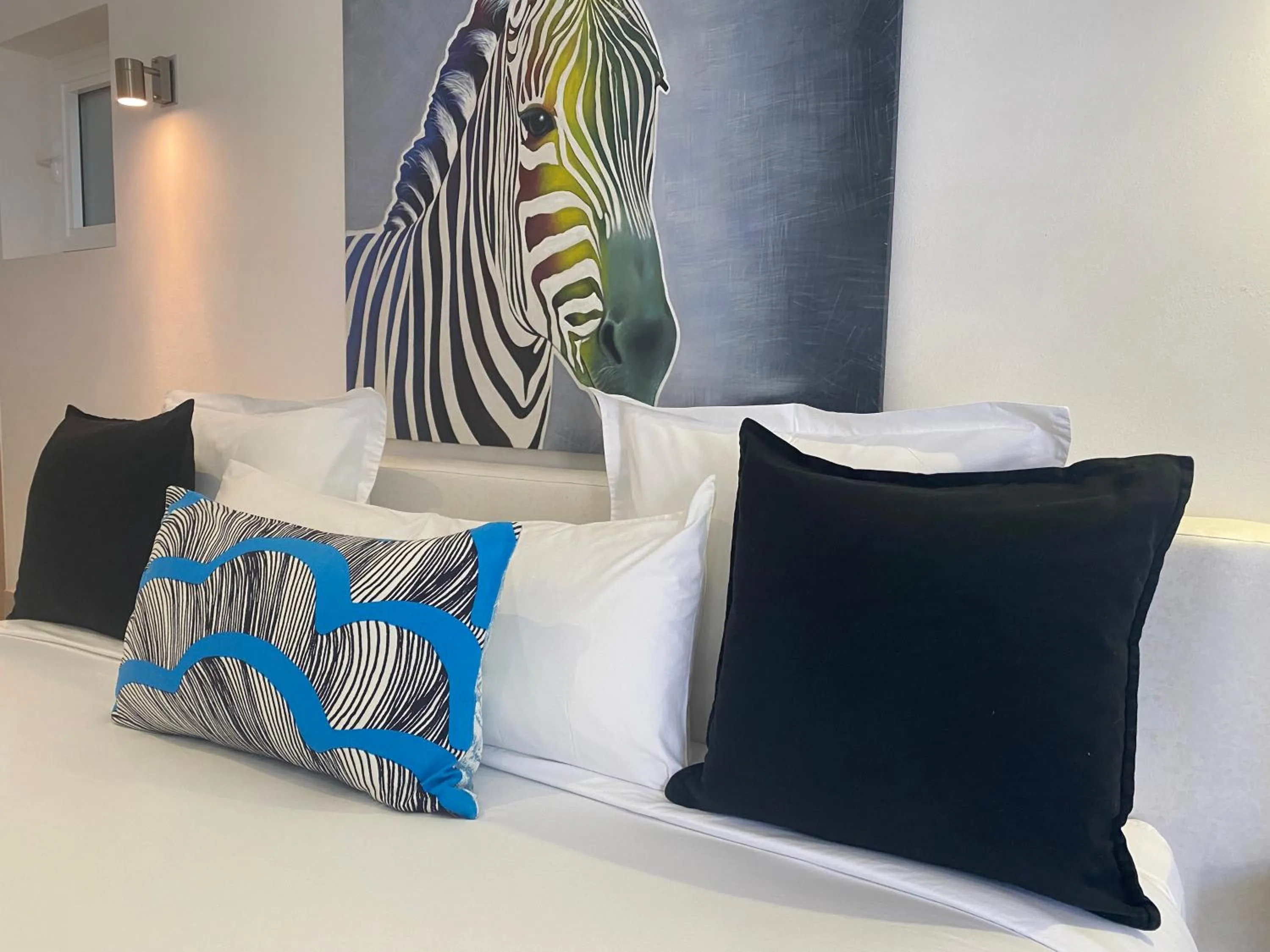 Bed in CASA-22 Luxury Boutique Hotel