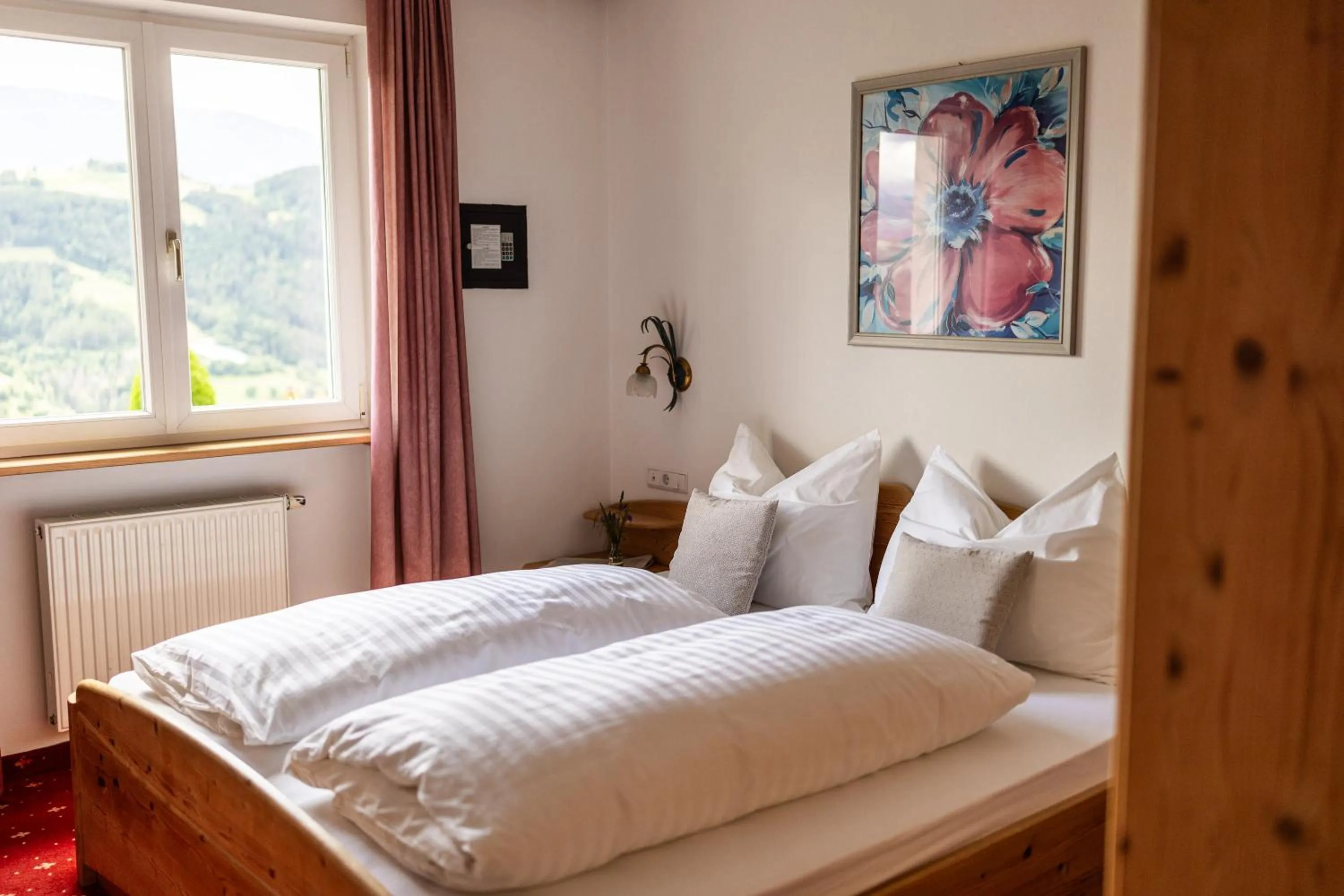 Bedroom, Bed in EGGER Apartments & Suites