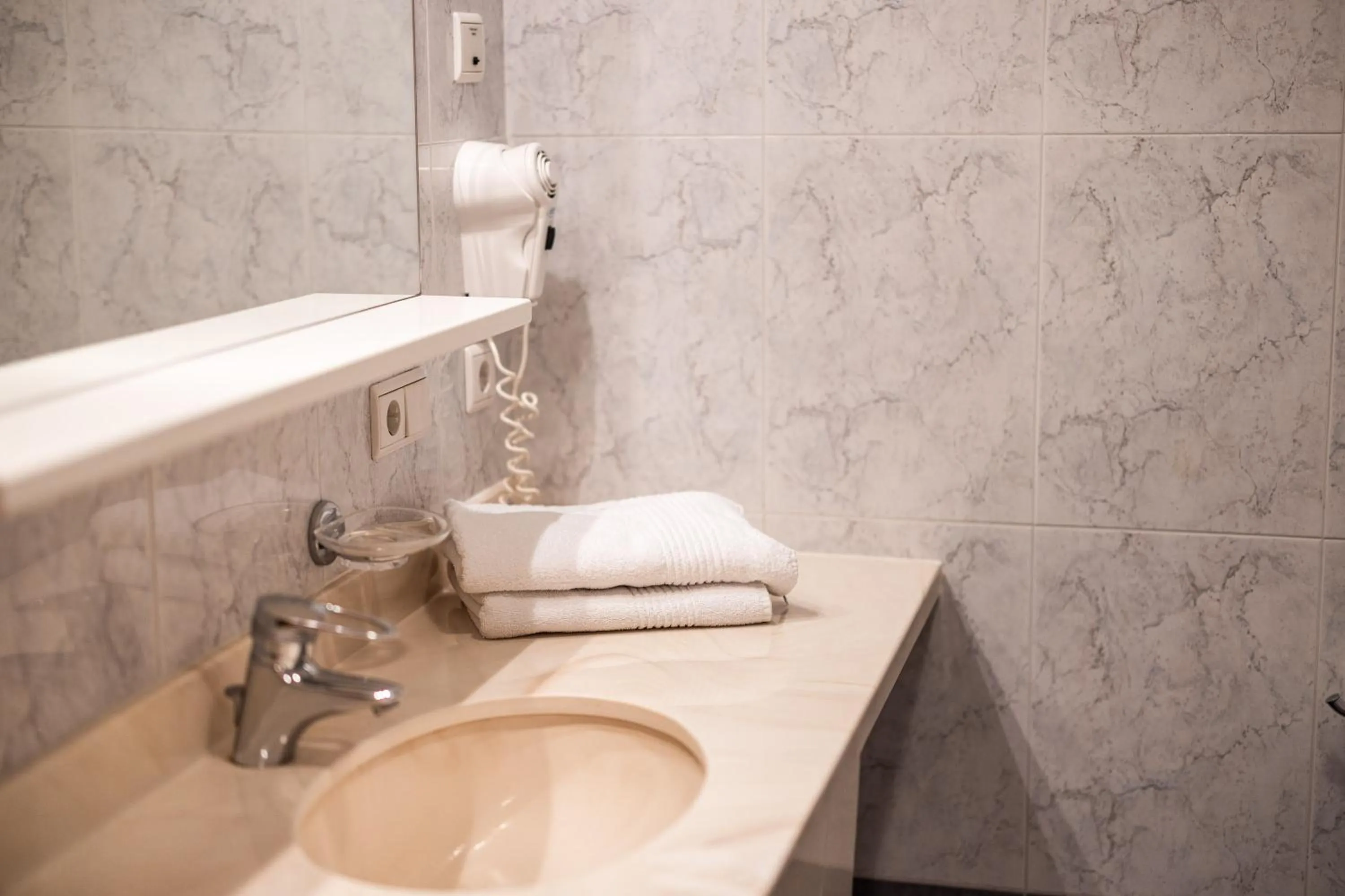 Bathroom in EGGER Apartments & Suites