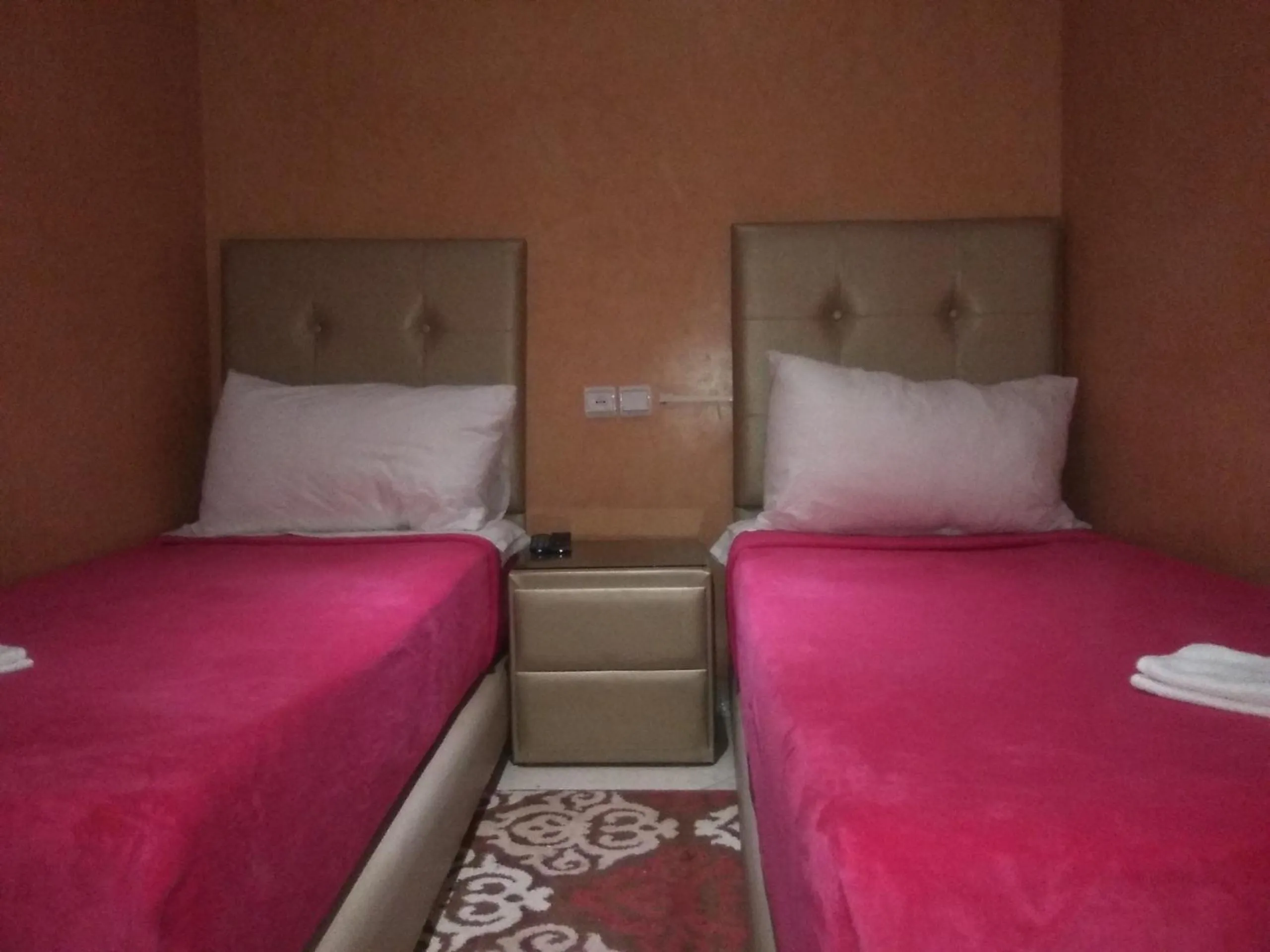 Bed in Hotel Rimal Sahara