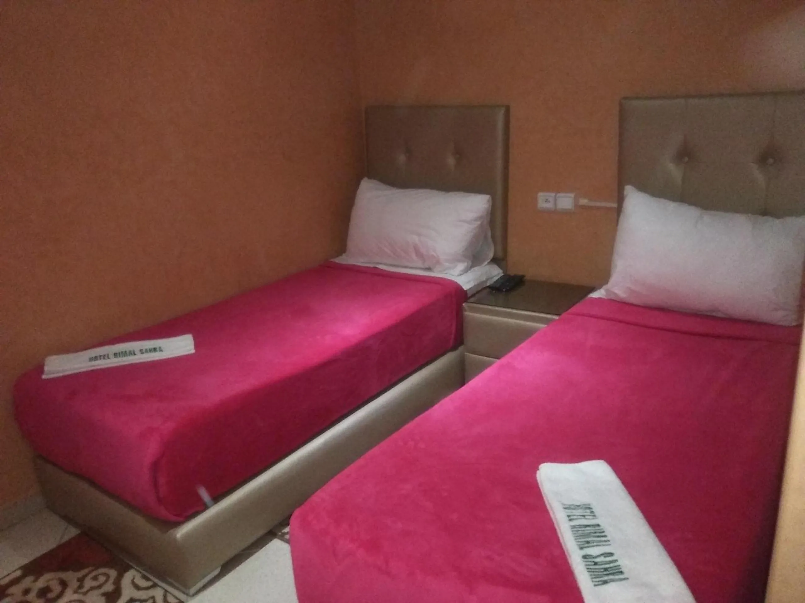 Bed in Hotel Rimal Sahara
