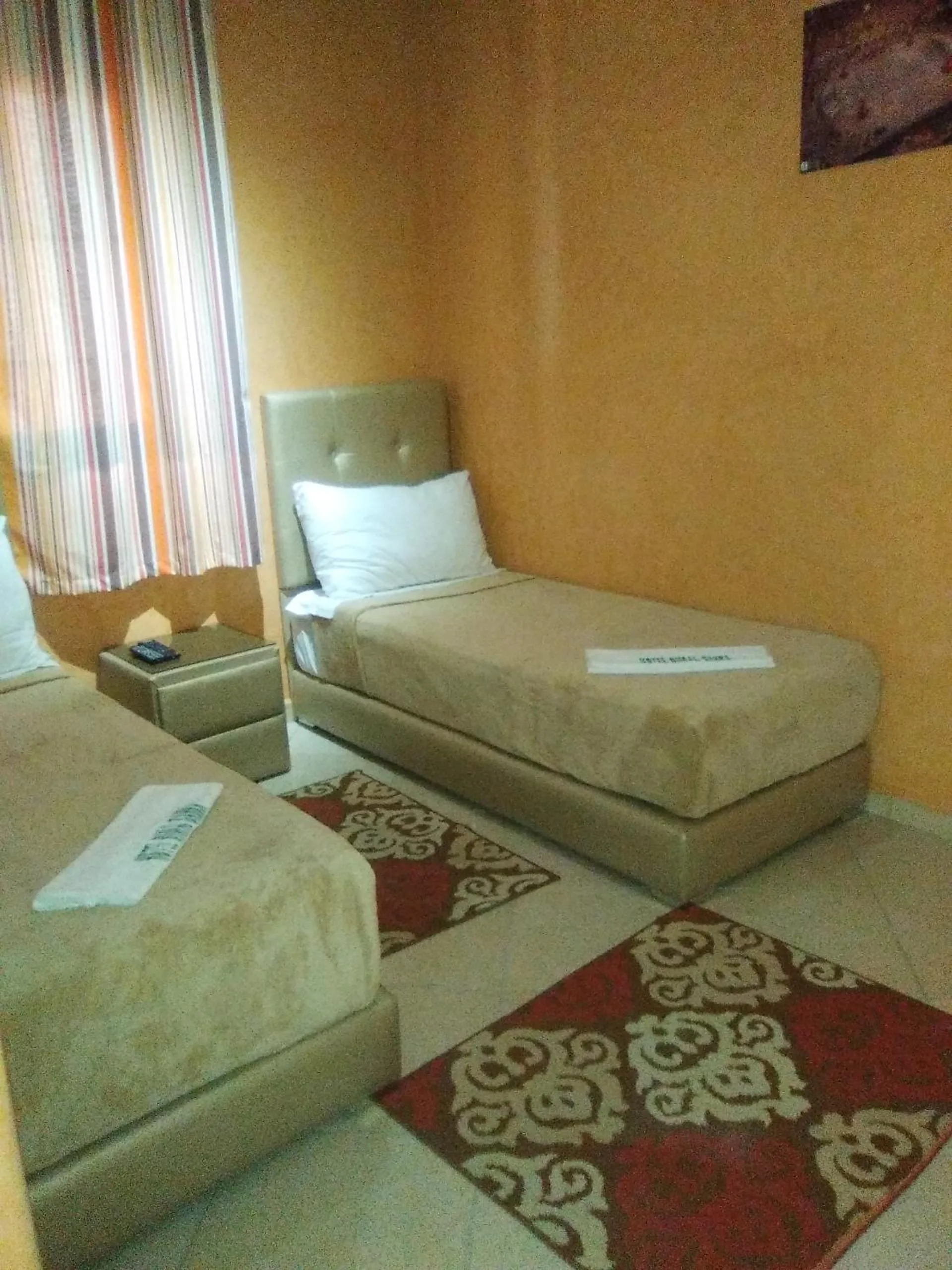 Bed in Hotel Rimal Sahara