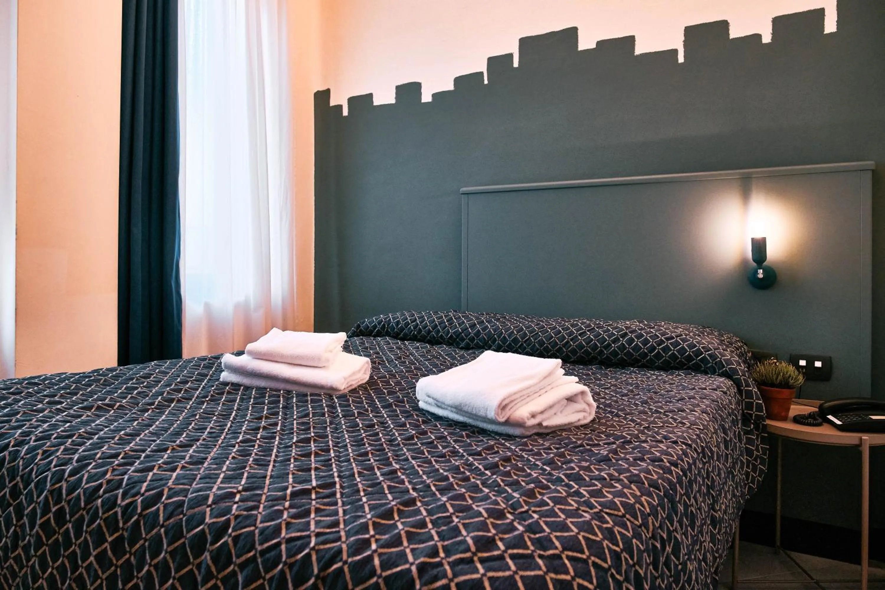 Bed in Hotel Bello by Ostello Bello