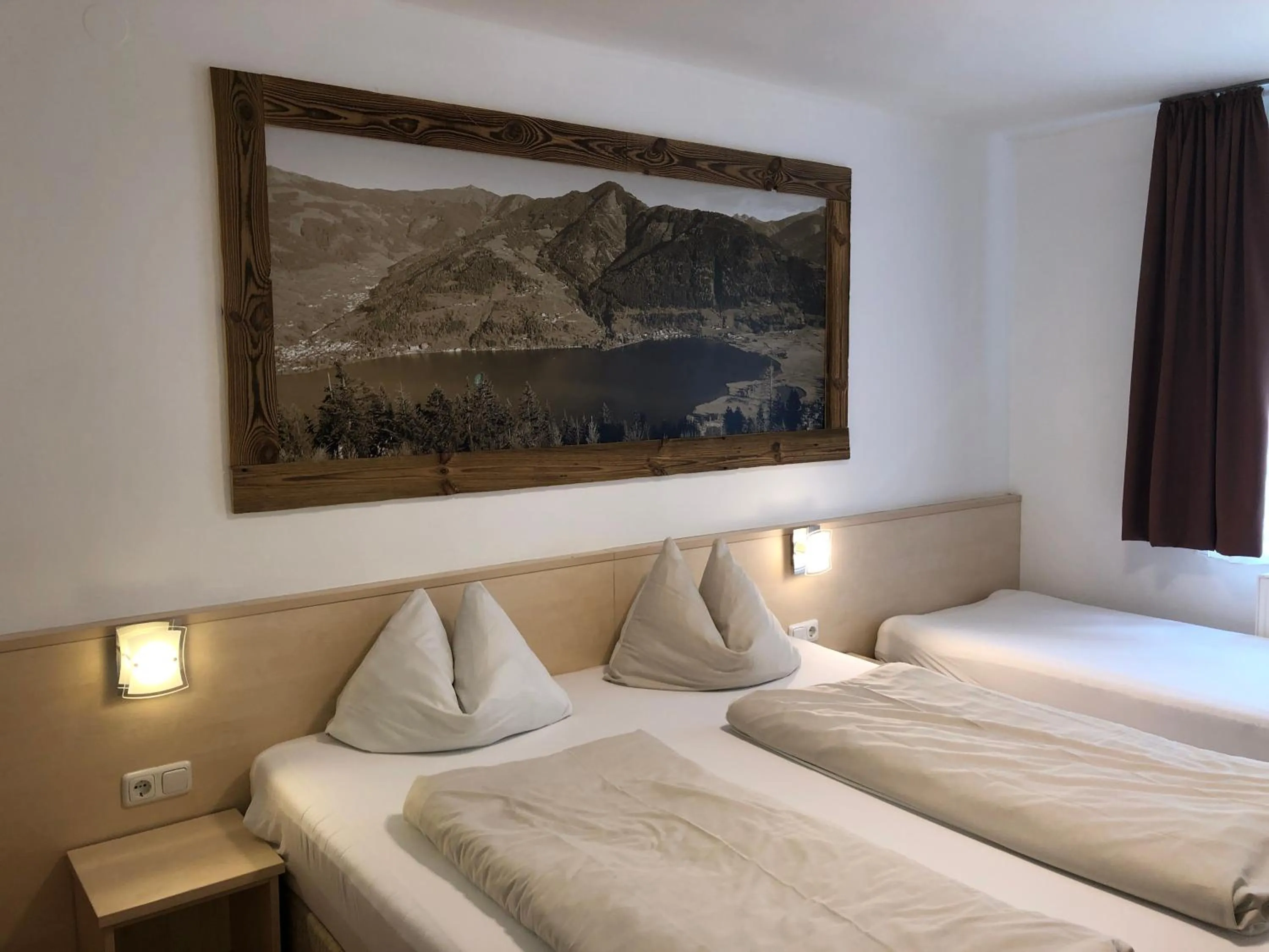 Bedroom, Bed in Familienappartements Eder - Free entry to Tauern SPA Kaprun included