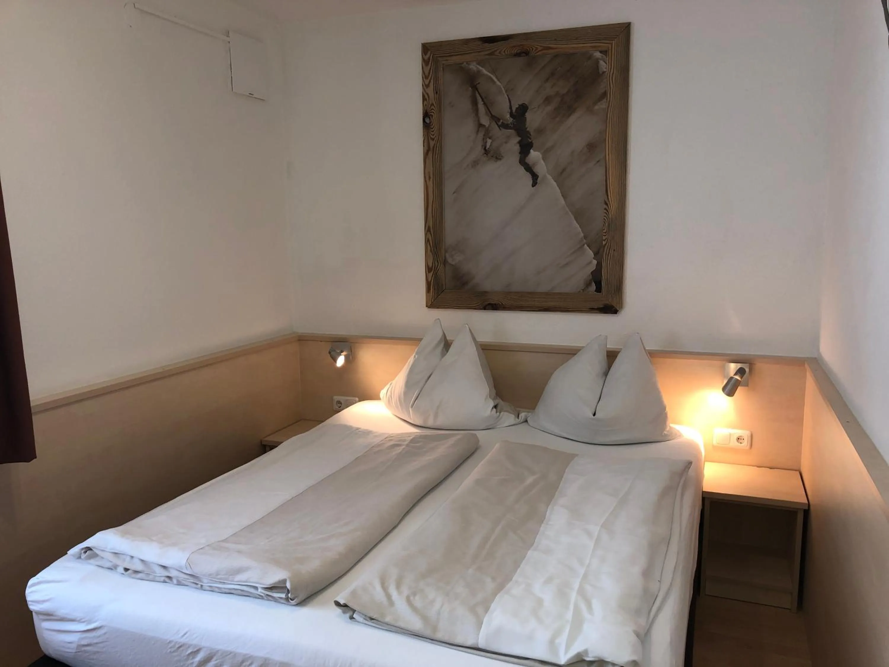 Bedroom, Bed in Familienappartements Eder - Free entry to Tauern SPA Kaprun included