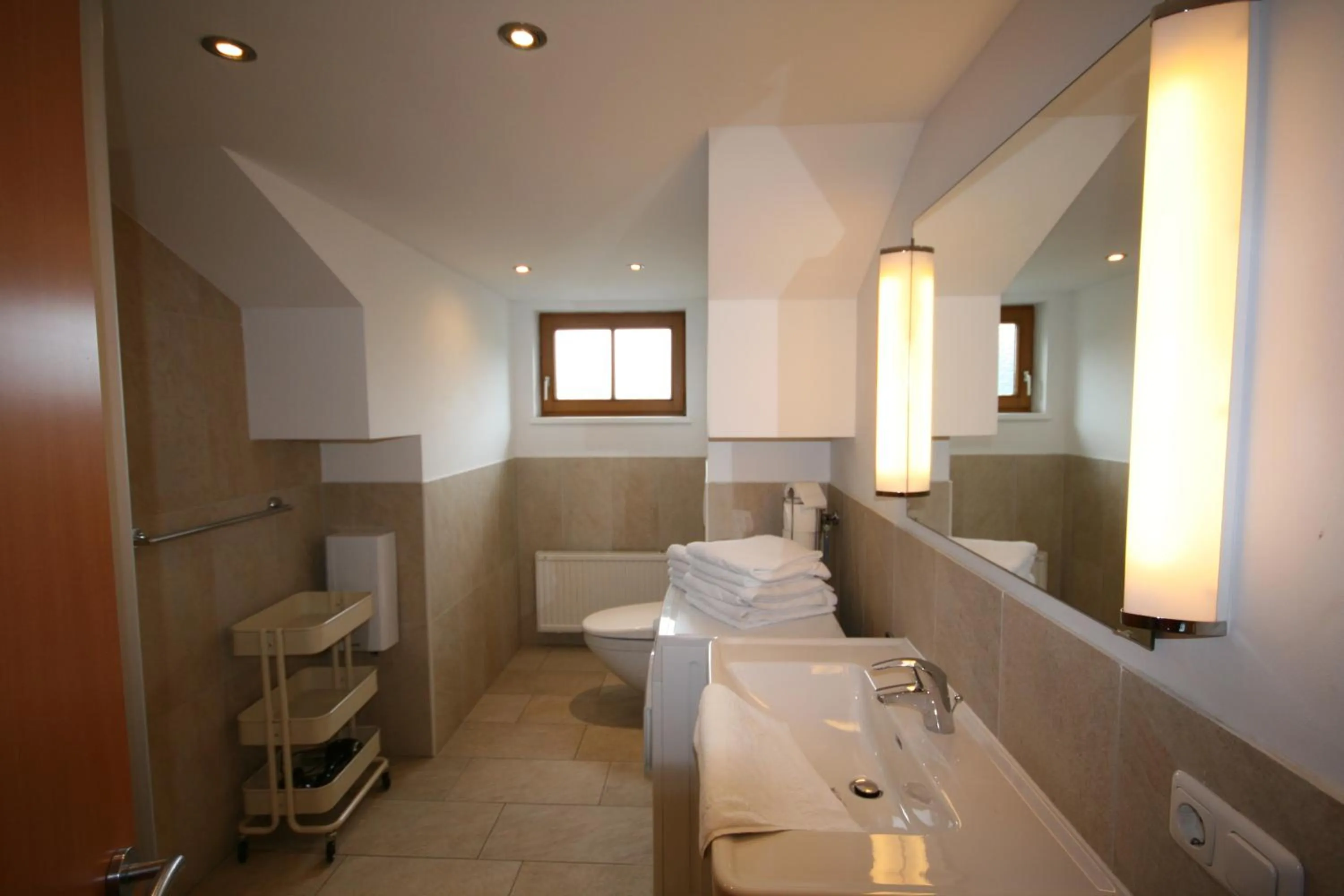 Bathroom in Familienappartements Eder - Free entry to Tauern SPA Kaprun included