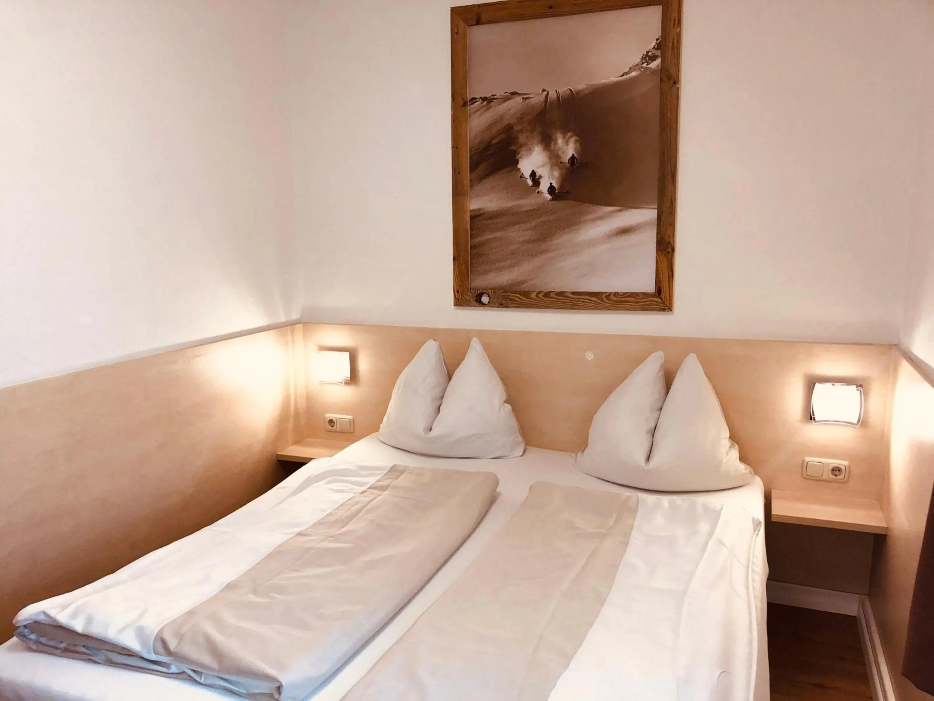 Bedroom, Bed in Familienappartements Eder - Free entry to Tauern SPA Kaprun included