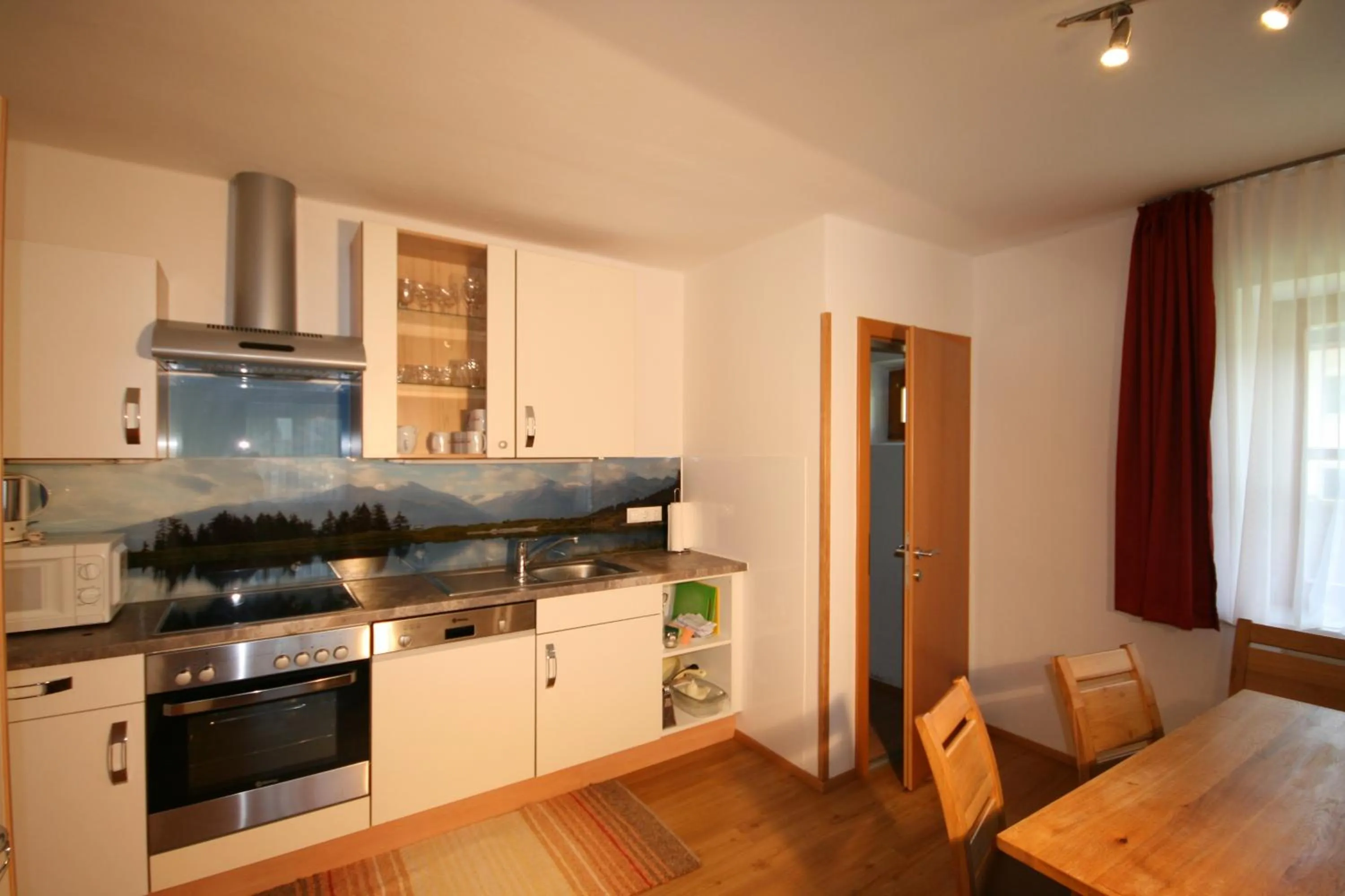 Kitchen or kitchenette in Familienappartements Eder - Free entry to Tauern SPA Kaprun included