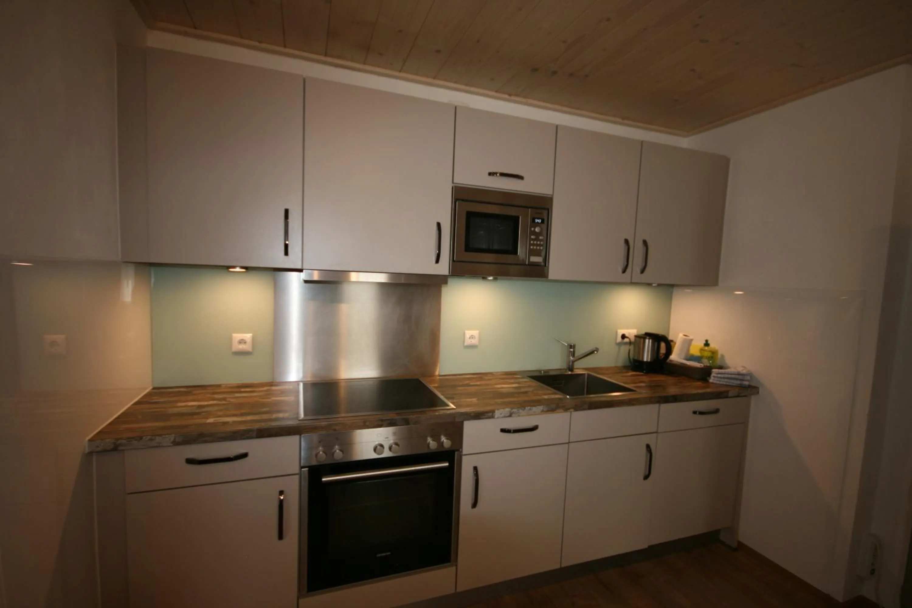 Kitchen or kitchenette in Familienappartements Eder - Free entry to Tauern SPA Kaprun included