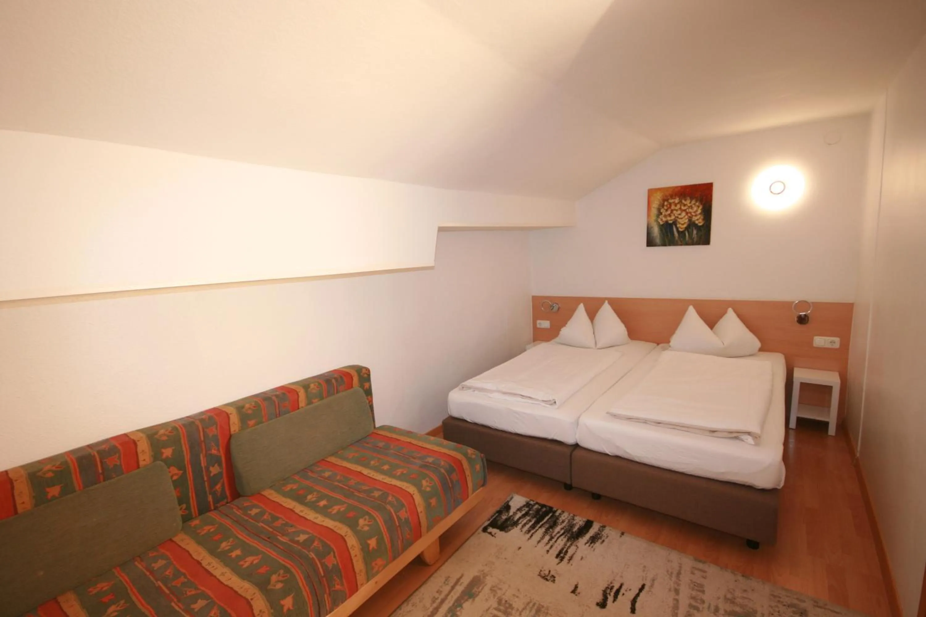 Bedroom, Bed in Familienappartements Eder - Free entry to Tauern SPA Kaprun included