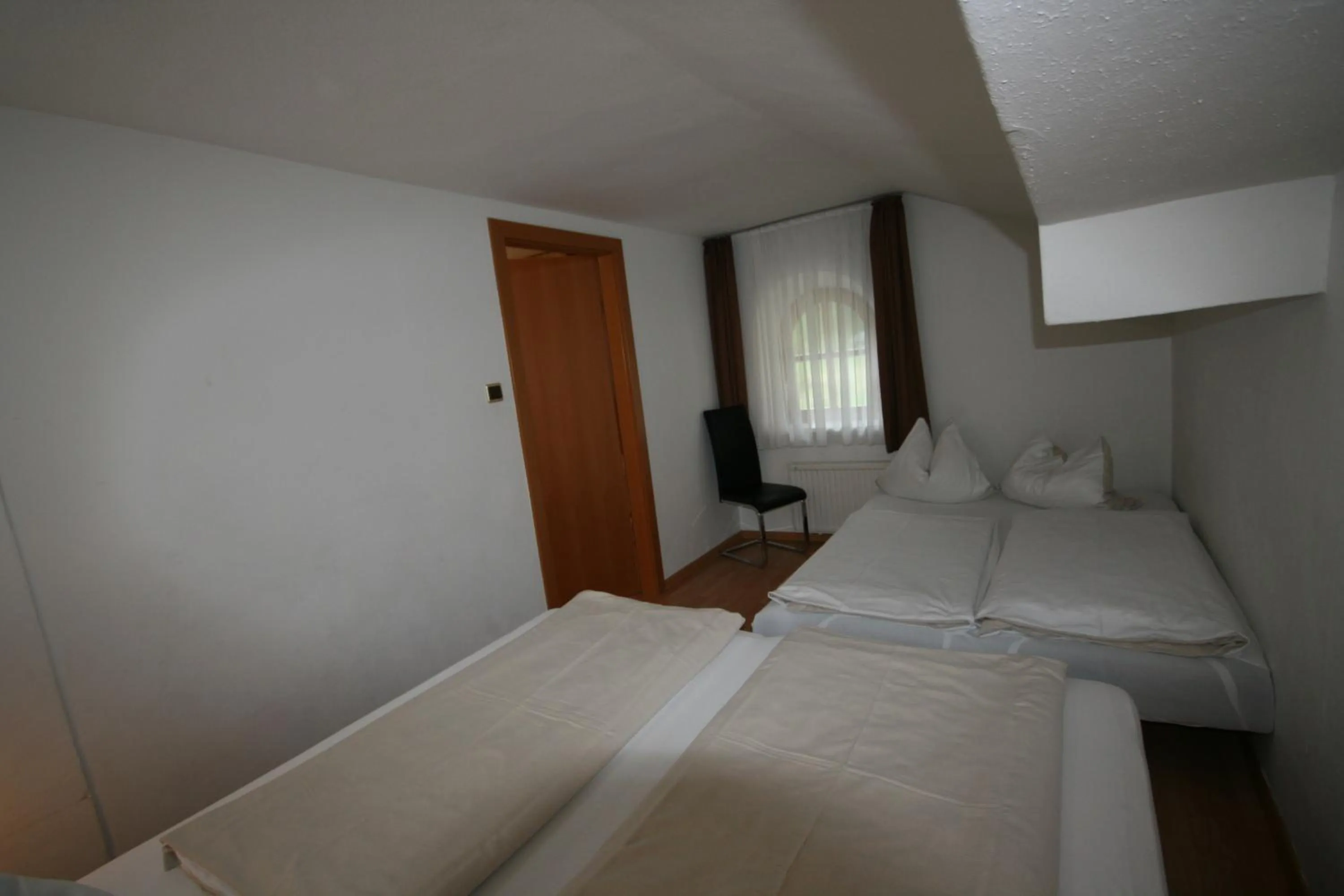 Bedroom, Bed in Familienappartements Eder - Free entry to Tauern SPA Kaprun included