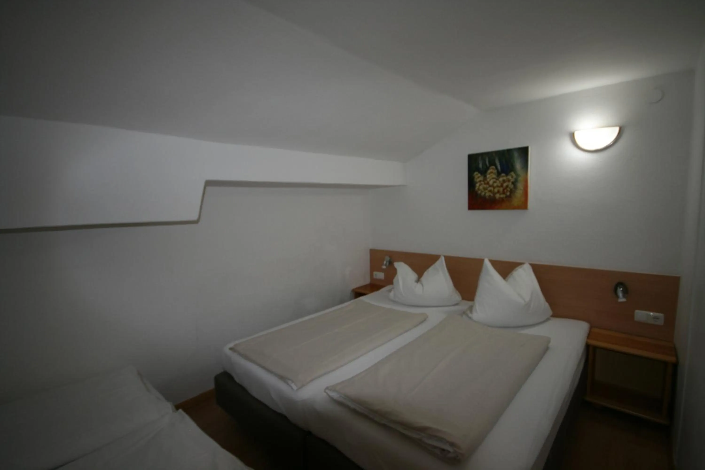 Bedroom, Bed in Familienappartements Eder - Free entry to Tauern SPA Kaprun included