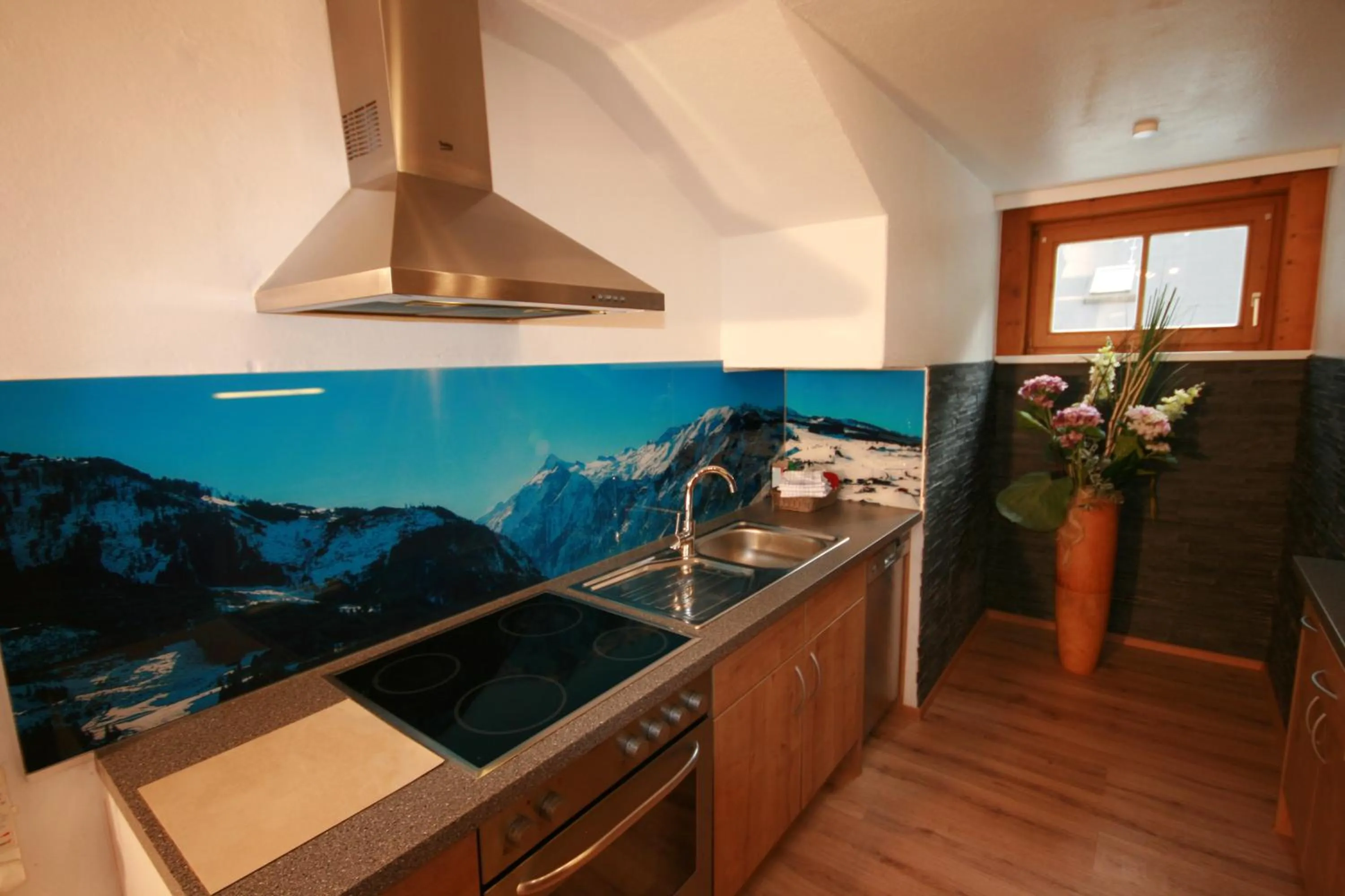 Kitchen or kitchenette in Familienappartements Eder - Free entry to Tauern SPA Kaprun included