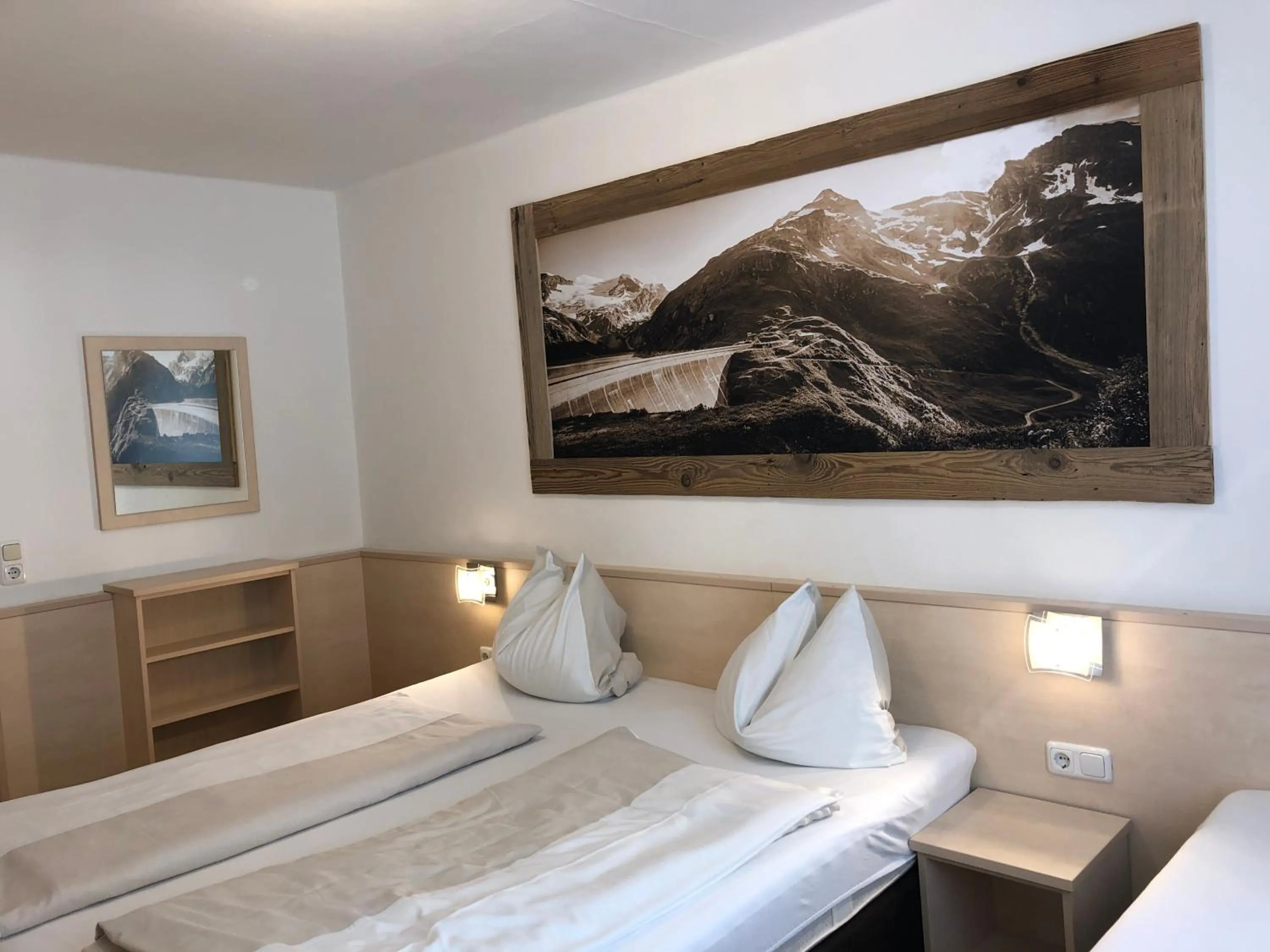 Bedroom, Bed in Familienappartements Eder - Free entry to Tauern SPA Kaprun included