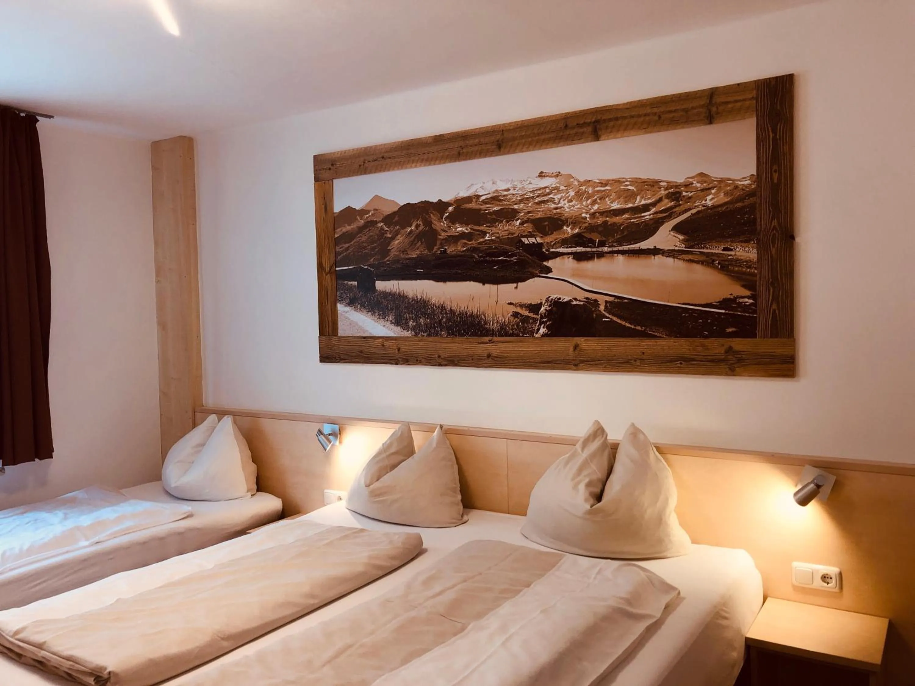 Bedroom, Bed in Familienappartements Eder - Free entry to Tauern SPA Kaprun included