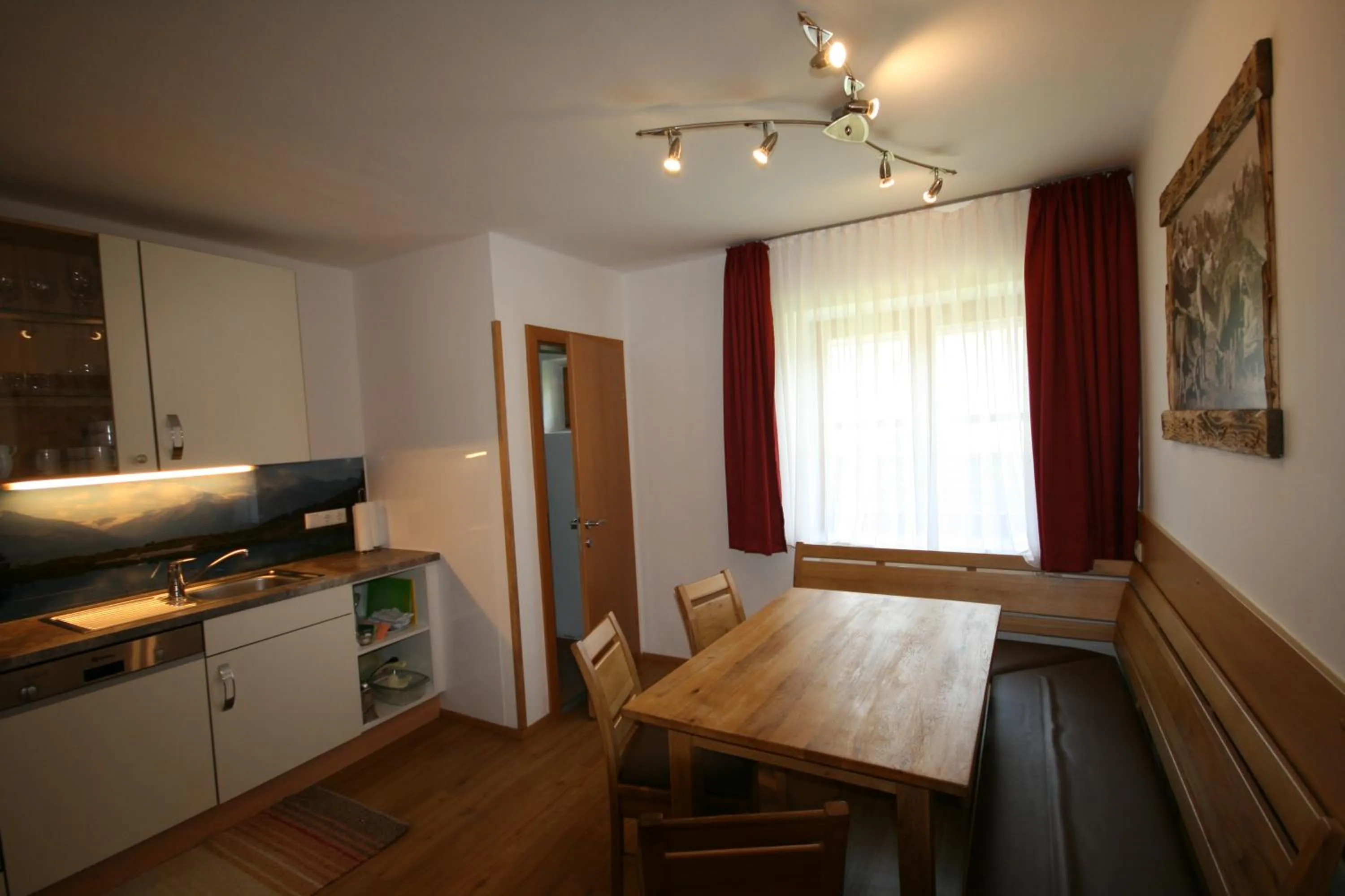 Kitchen or kitchenette in Familienappartements Eder - Free entry to Tauern SPA Kaprun included