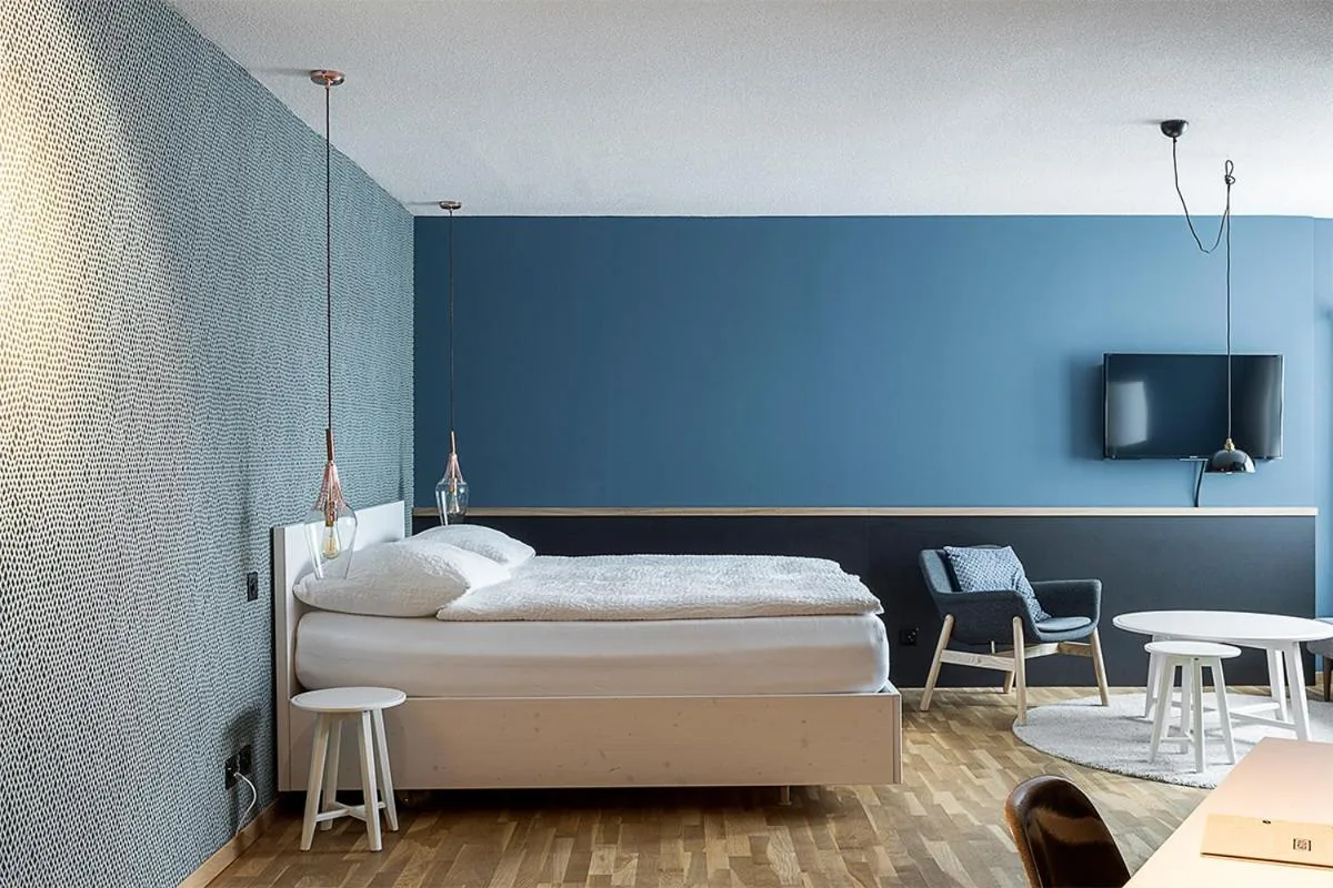 Bed in ADLER Boutique Hotel