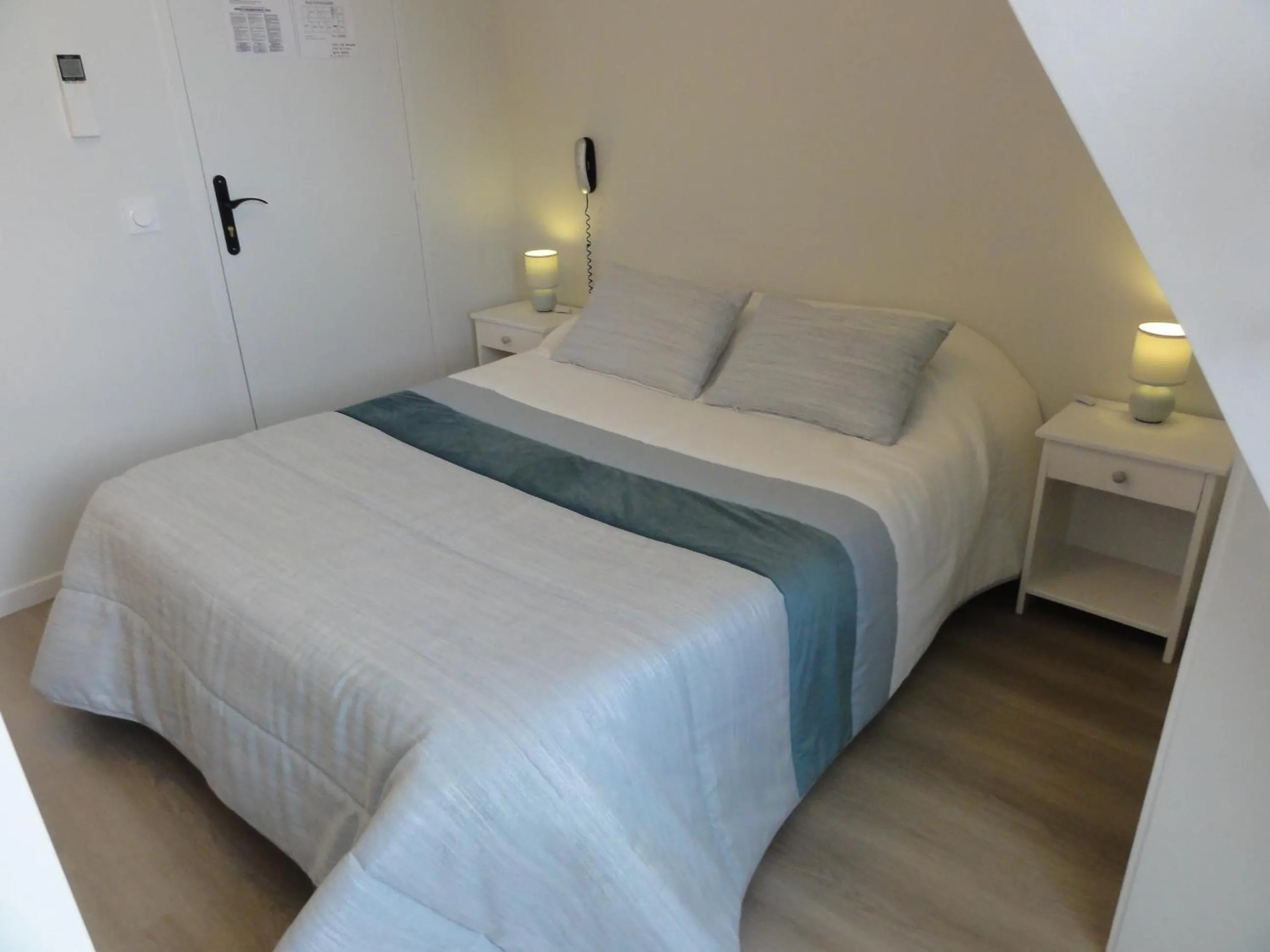 Bed in Hotel des Voyageurs